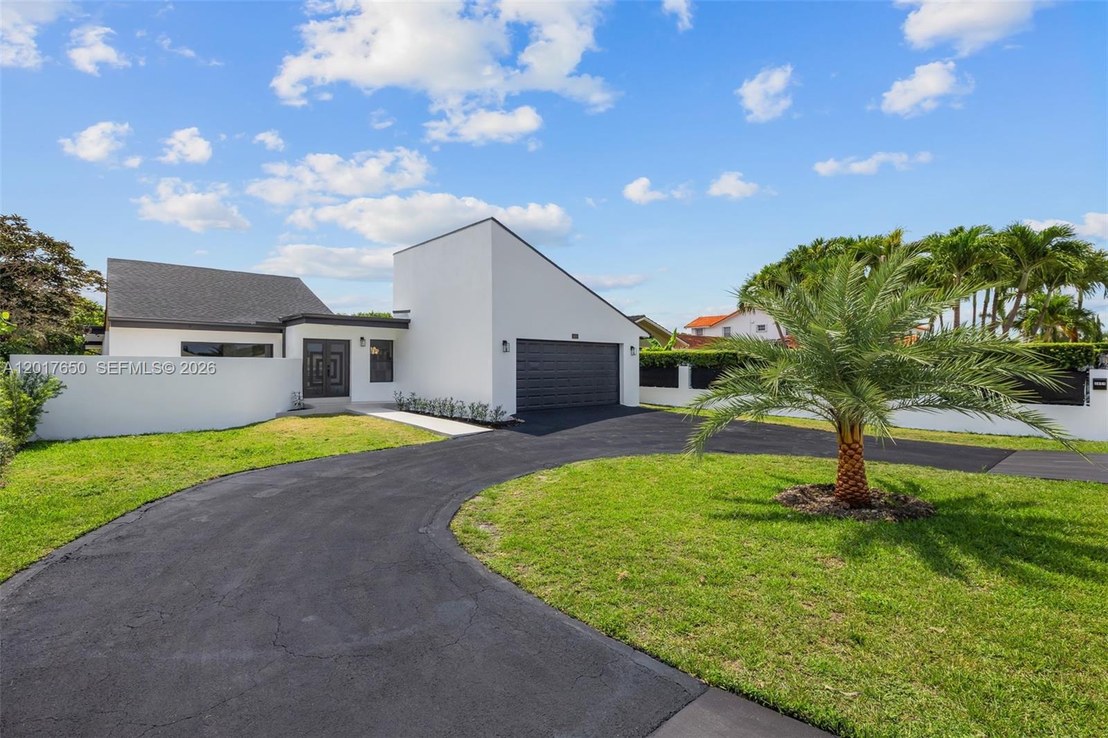 Tucked away on an oversized 16,200 SF lot in the highly desirable University Park/Westchester area, this elegant single-story residence captures the essence of Miami living. Bright, airy, and filled with natural light, the home features soaring ceilings, 4 spacious bedrooms, 2.5 bathrooms, and beautifully designed open living spaces that flow effortlessly for both everyday comfort and entertaining. Step outside into your own tropical retreat, surrounded by lush greenery and fruit trees, with two covered terraces perfect for morning coffee, family gatherings, or relaxing Miami evenings. The expansive backyard offers endless possibilities, including plenty of room for a pool. Warm, inviting, and perfectly located near FIU, top schools, dining, shopping, and major highways, this is the kind of home that makes you never want to leave.