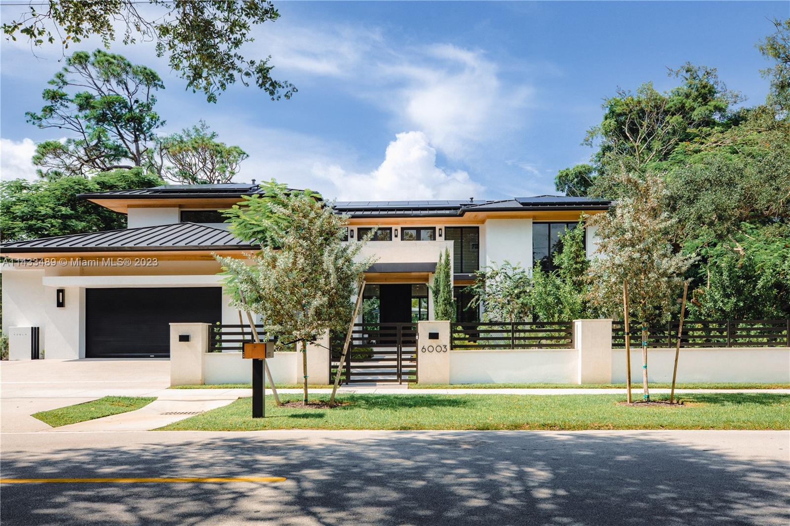 New construction 7,483 sf home by the Calta Group on an oversized 17,000 sf+ lot, with 6 bedrooms, 6 1/2 bathrooms, studio, media room and gym, in an open floor plan with lots of natural light, volume ceilings and very generous spaces. Furnished and complete with impeccable interior designs by Sensi Casa. Top of the line appliances by Subzero and Wolf, Mia Cuccina Italian cabinetry in the kitchen, closets, laundry room and bathrooms, and an oversized principal bedroom with 2 walk-in closets. Sliding impact doors open to a beautiful backyard with heated pool, jacuzzi and BBQ grill.  Features include an elevator, Hunter Douglas automatic blind system, state-of-the-art electronics, security system, solar panels, EV charger, smart home system throughout, and more.
