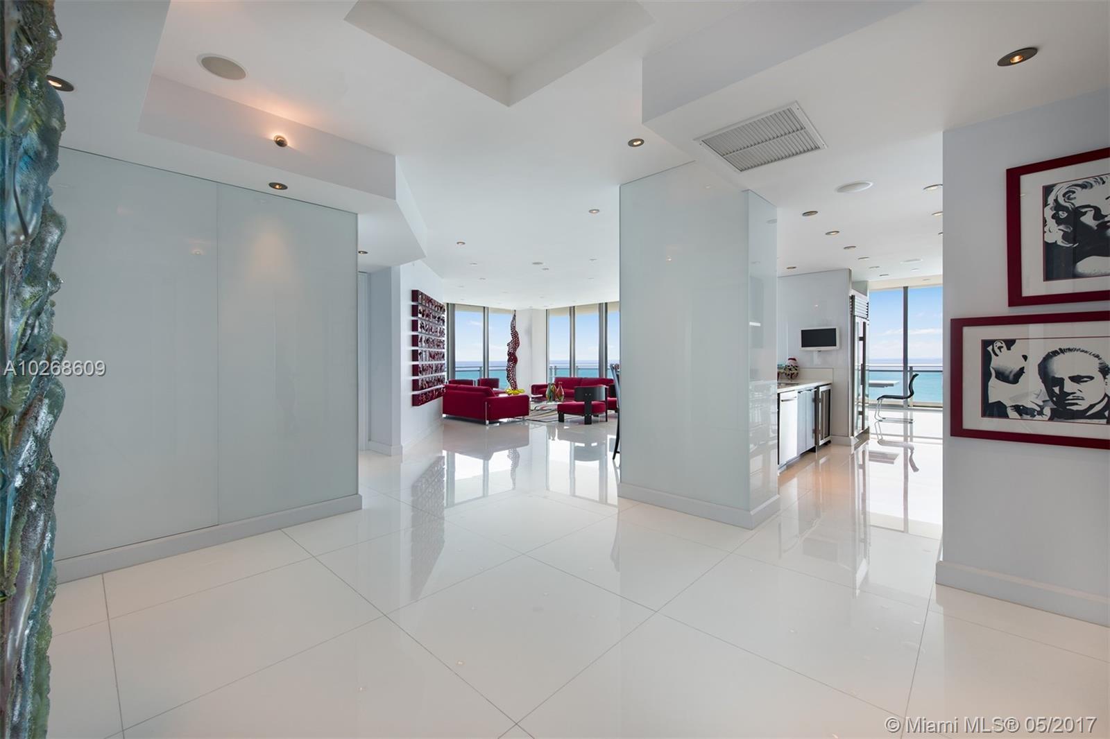 MAGNIFICENT CORNER SKY HOME (F) LINE WITH INFINITY VIEWS OF THE OCEAN & INTRACOASTAL. CUSTOM
DESIGNED COSMOPOLITAN LAYOUT. METICULOUSLY DECORATED WITH ATTENTION TO DETAIL FROM FLOOR TO
CEILING. SUPERB APPOINTMENTS AND FINISHES. PERFECT FOR ENTERTAINING. FULL SERVICE LUXURY BUILDING OFFERS OPULENT RITZ CARLTON WORLD CLASS HOTEL AMENITIES AND BEACH ACCESS WITH POOL SERVICE.