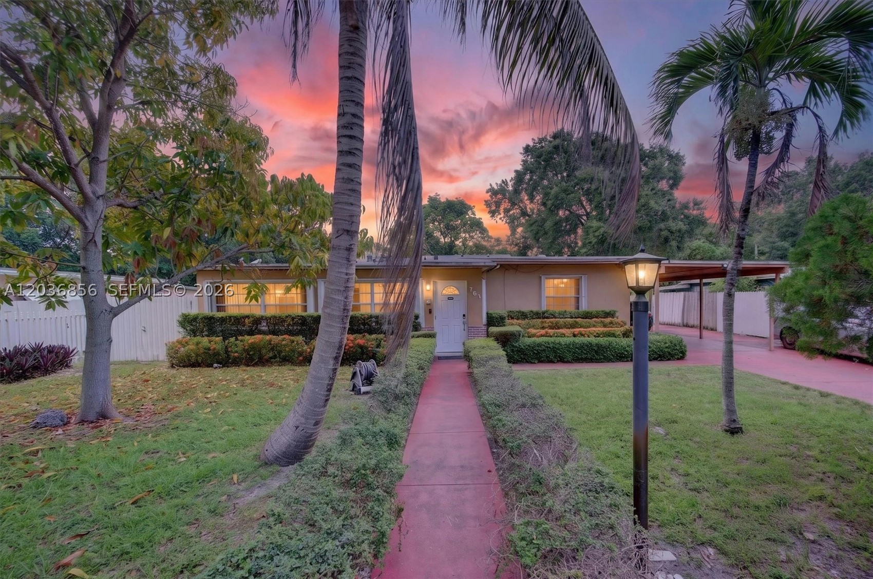 3 bedroom 2 bath home and a 2/1 in law quarters. ****Tile floors***Large updated kitchen in 2017 ***Large Florida room*****Central Air***2460 sq ft living area**Carport******Huge 4 car driveway  *** Fully fenced***Nice landscaping****Formal dining room***Expensive solar  paneled roof ****At closing the owner will pay off a Pace loan which will reduce the real estate taxes significantly