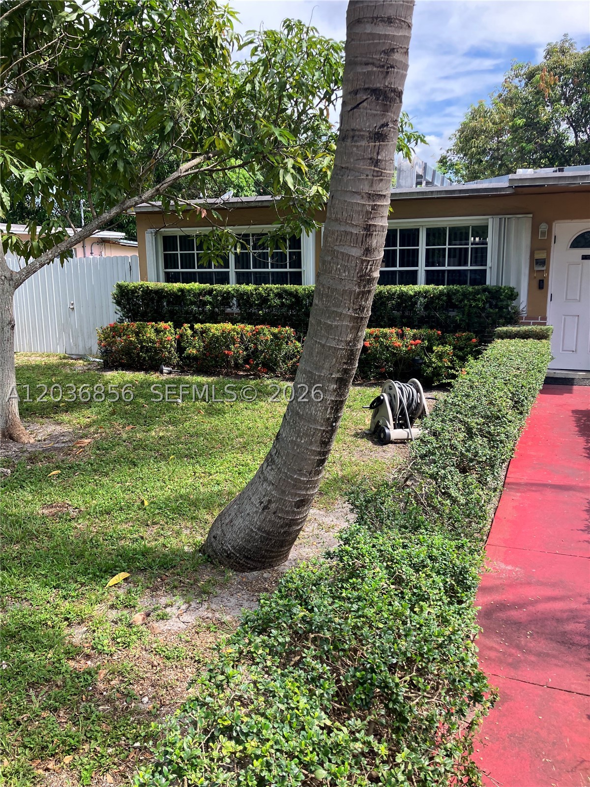 3 bedroom 2 bath home and a 2/1 in law quarters. ****Tile floors***Large updated kitchen in 2017 ***Large Florida room*****Central Air***2460 sq ft living area**Carport******Huge 4 car driveway  *** Fully fenced***Nice landscaping****Formal dining room***Expensive solar  paneled roof ****At closing the owner will pay off a Pace loan which will reduce the real estate taxes significantly