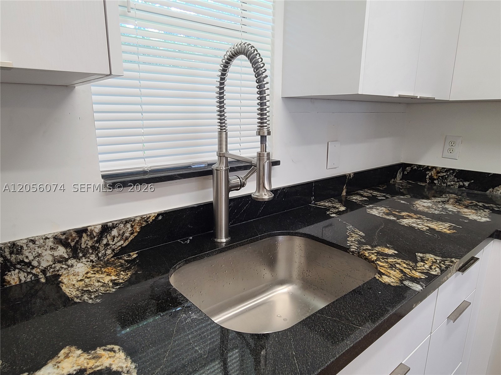 Completely renovated unit: kitchen with custom cabinets and gorgeous special order granite, bathroom with matching granite countertop, dishwasher, vinyl and tile flooring, newer water heater, central A/C, flat ceiling, lighting, metal security door, no expense spared. Community offers pool, laundry room. Walking distance to NOVA Southeastern University. Excellent location near major roadways I595, I75, I95, TURNPIKE, restaurants, shopping. Parking conveniently located near unit.