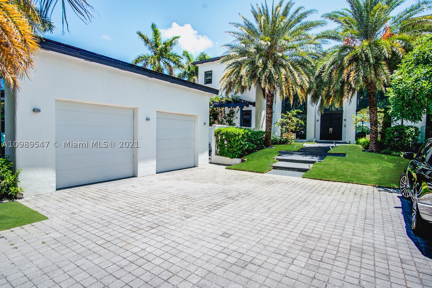 Stunning Modern Home located on the prestigious Hibiscus Island with a 24/7 guard gate and patrol. This 7,700 SF estate sits on a 18,800 SF lot with a breathtaking views to Downtown Miami and Brickell, which provide for an amazing sunset everyday. This home features 6 bedrooms, 7.5 bathrooms, with masterfully designed open living, dining & family areas. Impeccable outdoor areas that features a full summer kitchen, an oversized swimming pool, and private dock for a boat up to 75 feet. A must see!