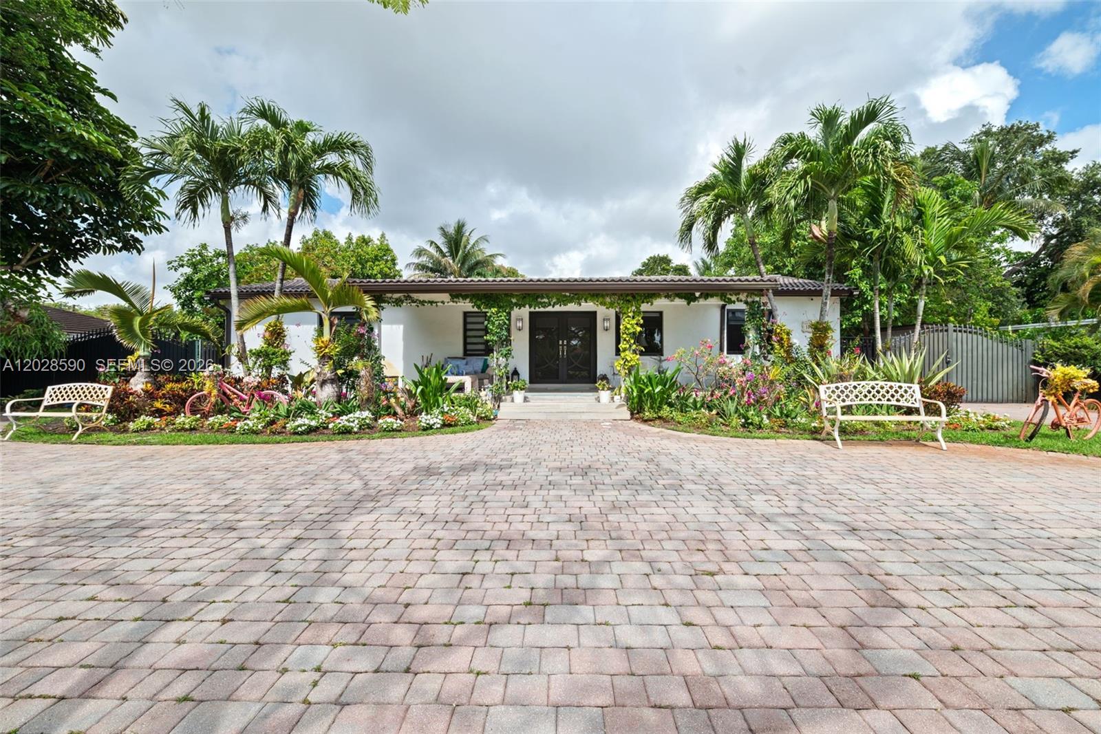 Welcome to your dream Estate at 13700 N Miami Ave, Miami, FL 33168! This stunning property boasts an expansive layout with 6 bedrooms and 4 bathrooms, offering ample space for family living and entertaining. The heart of the home features a modern kitchen equipped with top-of-the-line appliances, seamlessly flowing into a spacious living area that invites natural light.
Step outside to discover your own private oasis, highlighted by a spectacular infinity pool that creates a tranquil retreat for relaxation and fun. Surrounded by lush landscaping, the outdoor space is perfect for hosting summer gatherings or enjoying quiet evenings under the stars.
Situated on a unique 30,265 S/F  lot, this home provides plenty of room for outdoor activities and future expansion. 
Open concept living with the privacy of 4 master bedroom. Italian Marble flooring, top granite kitchen counters and exquisite outdoor pavers caters the modern luxury and privacy.
In laws quarter, laundry room facilities and plenty of space for additional built out. 
Don't miss this rare opportunity to own a piece of Miami paradise, where luxury meets comfort. Schedule a showing today and experience all that this exceptional residence has to offer!