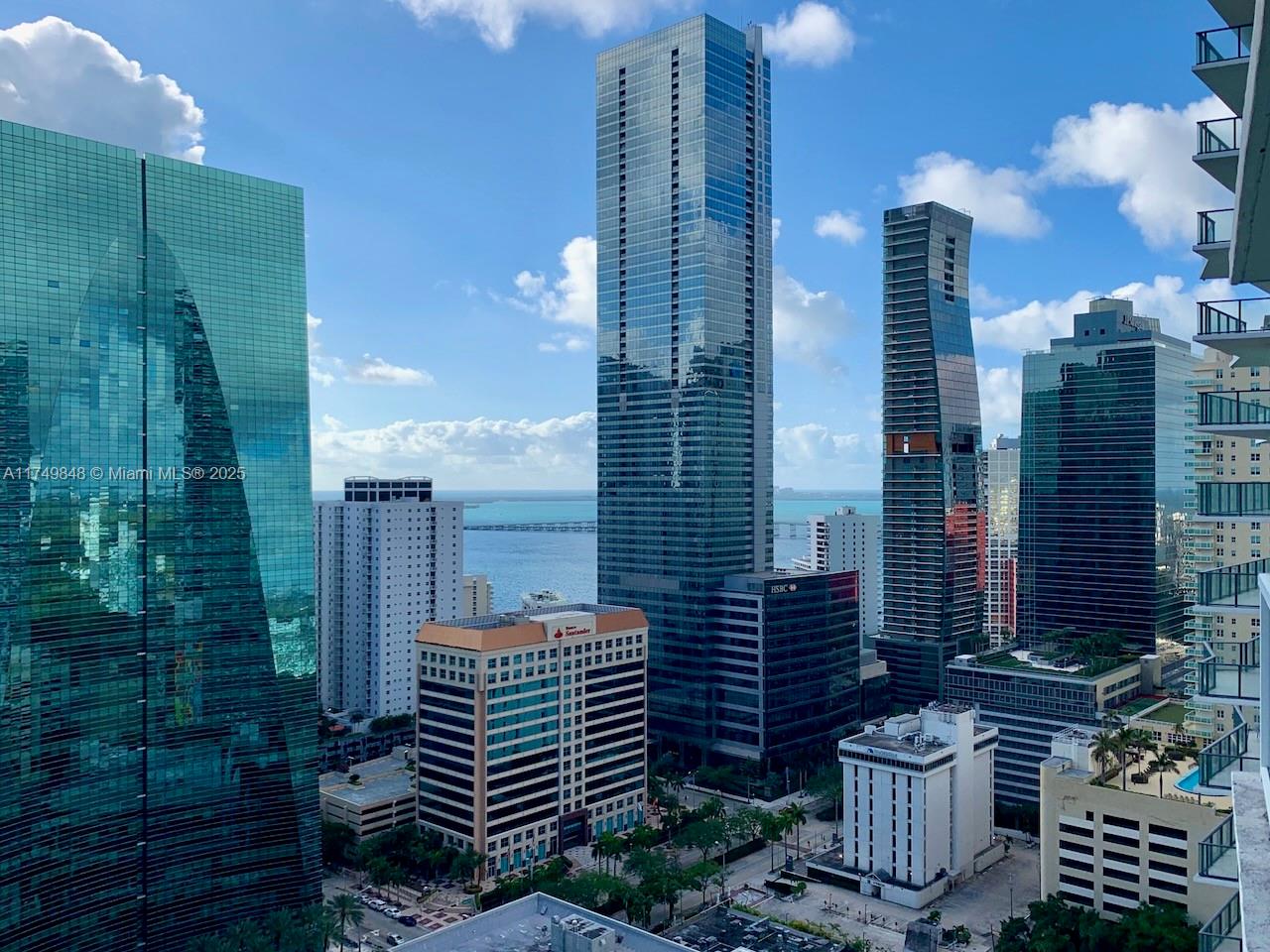 Remodeled-860 SF-Largest floor plane in the building. 1 Bed, 1.5 Baths. New Light gray porcelain floor all over. New vanities in Bathrooms, Updated Kitchen with new appliances. Freshly painted. Tandem parking allow TWO CARS. Hight Floor Beautiful open view to Bay and High-rises. BEST DEAL at Vue at Brickell. AC Filter maintenance and Internet included. Available April First. Text Listing Agent
