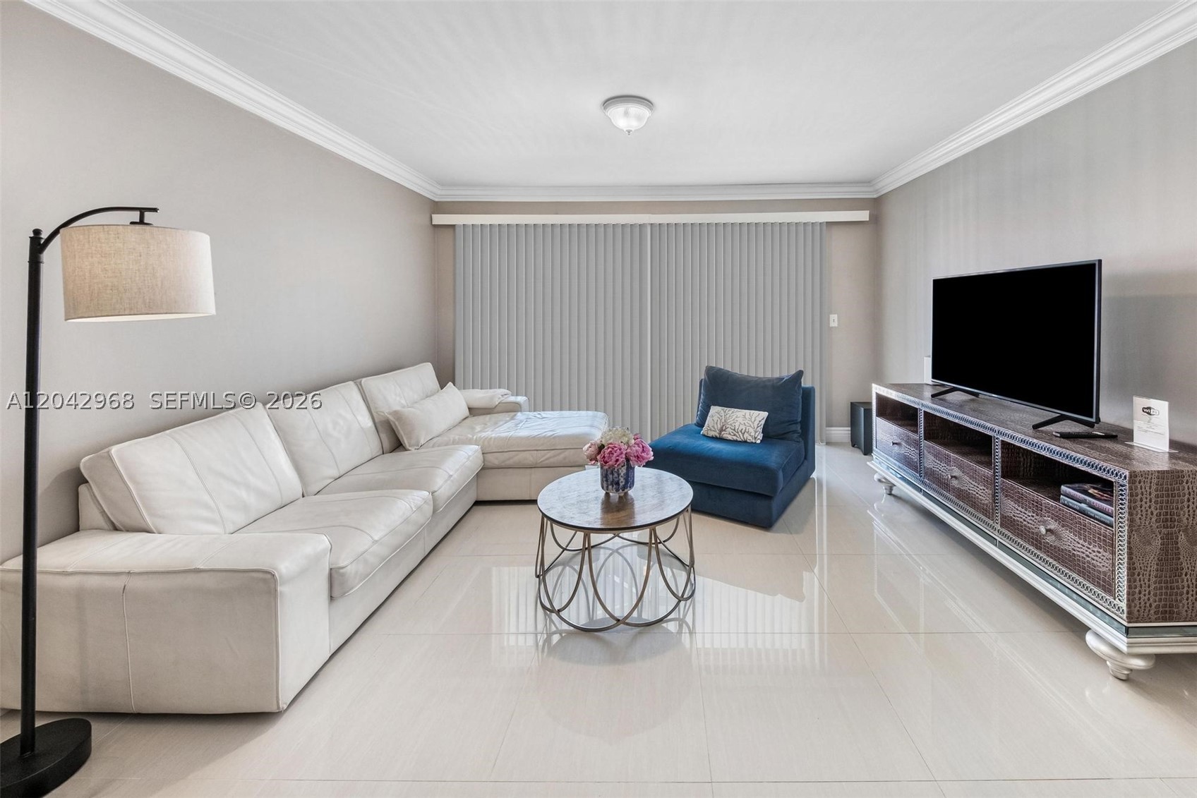 Completely remodeled 2-bedroom, 2-bath corner unit in a boutique waterfront building on the Intracoastal, just a short walk to the beach. This bright 1,139 SF residence features a renovated kitchen with stainless steel appliances, updated bathrooms, spacious bedrooms, ample closet space, and a private balcony with garden, pool, and partial water views. Assigned covered parking space. Waterfront pool and landscaped grounds. Conveniently located near shopping, restaurants, houses of worship, and golf courses. Move-in ready and ideal as a primary residence, second home, or seasonal getaway.