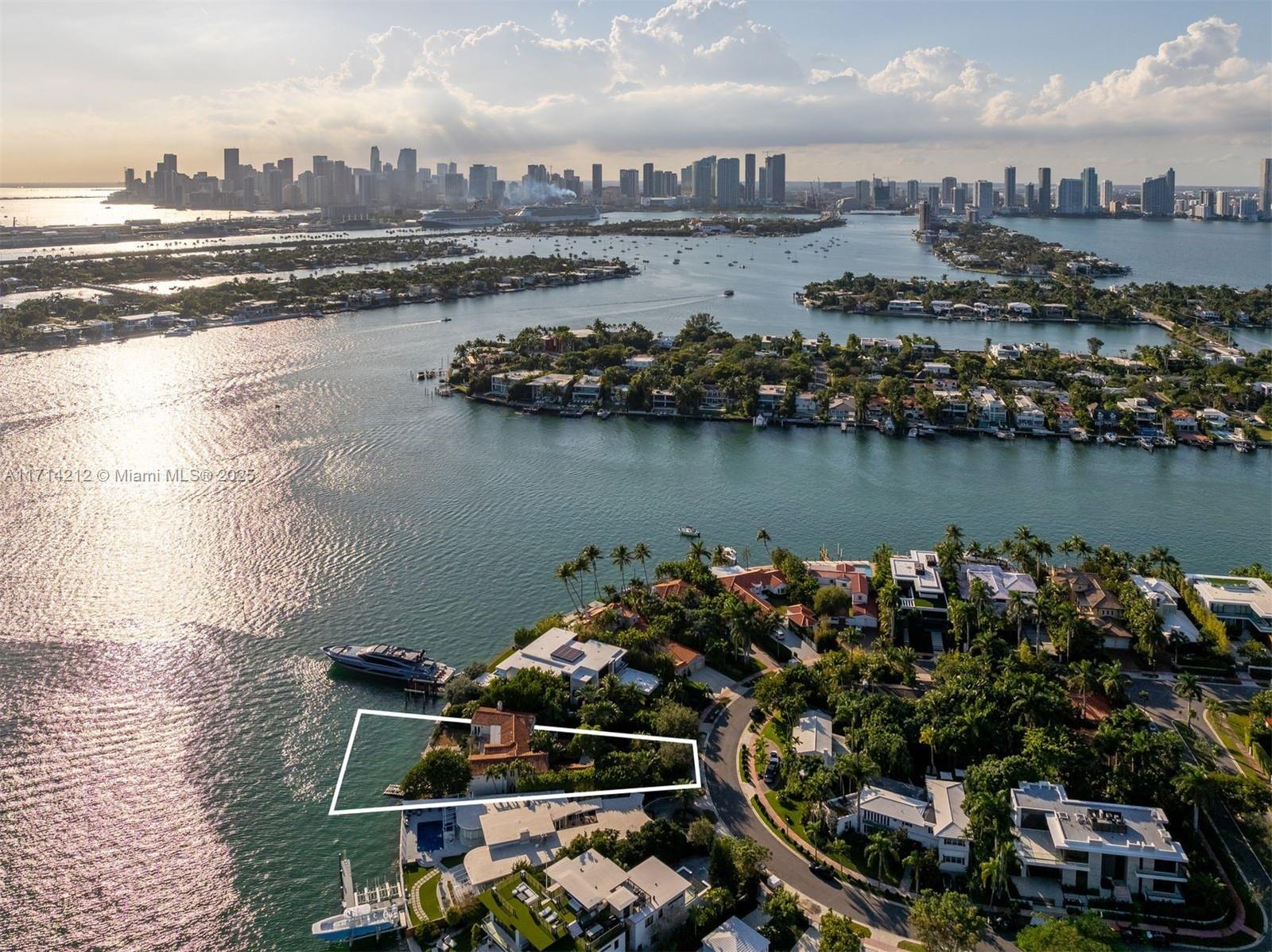 Perfect opportunity to build your dream home on the exclusive south tip of Rivo Alto Island. This oversized 12,900 SF lot features 105 feet of water frontage with stunning sunset views of the open bay and Miami Downtown skyline. The 2-story home boasts 4 bedrooms, 5 bathrooms, and over 5,000 SF of living space, including a sparkling pool with breathtaking vistas and a private dock offering the ultimate boating experience. Located in the coveted Venetian Islands, this property is just minutes from Miami’s finest dining, beaches, and shopping. Renovate the current residence or design a custom sanctuary, this property provides an extraordinary canvas to create a luxurious island retreat. Experience the best of Miami living with privacy, elegance, and unmatched open water views.