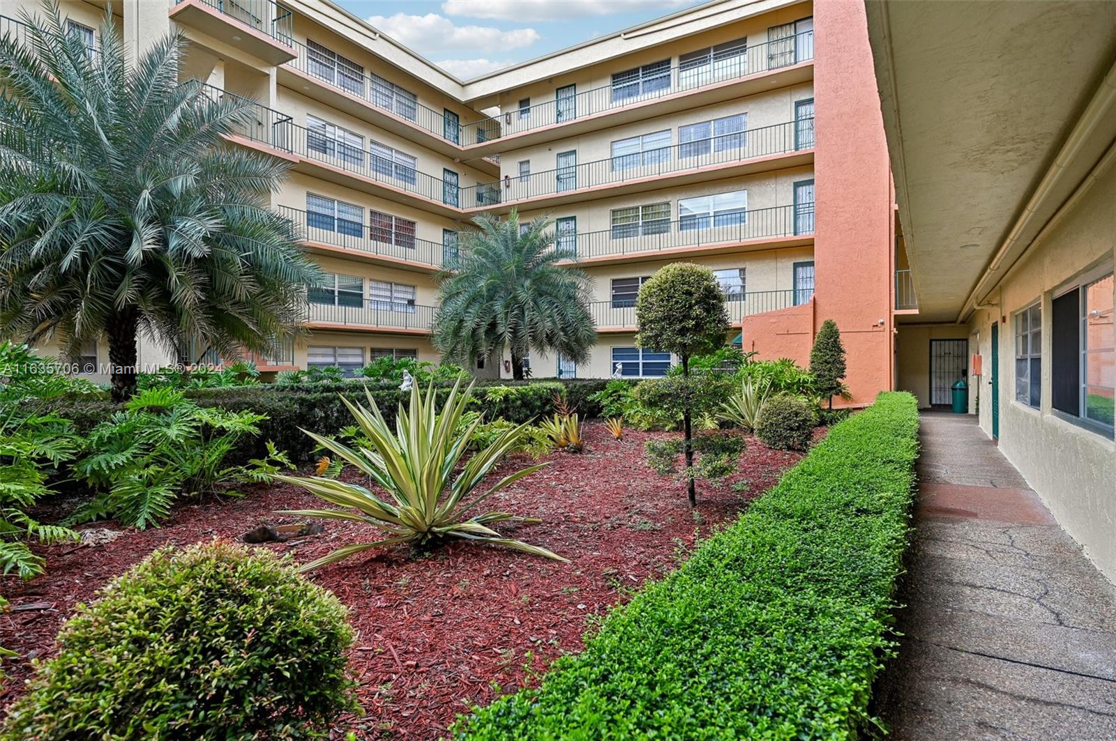 Priced to Sell - Gated Community -Experience the comfort of this ground-floor unit “Renovated & Remodeled” that feels like a spacious house, featuring an assigned parking spot right at your door for easy grocery unloading. The master bedroom features a walk-in closet, and the two bathrooms include granite shower walls, countertops and floors, along with additional storage in the kitchen and a linen closet. Enjoy all-tile flooring, an open kitchen with elegant granite countertops, and the afternoon sun on your cozy porch. Benefit from in-unit washer and dryer, central air conditioning, and an abundance of natural light. Conveniently located near the pool and just minutes from shopping, dining, and essential services via the Palmetto Expressway, don’t miss this unique gem!
