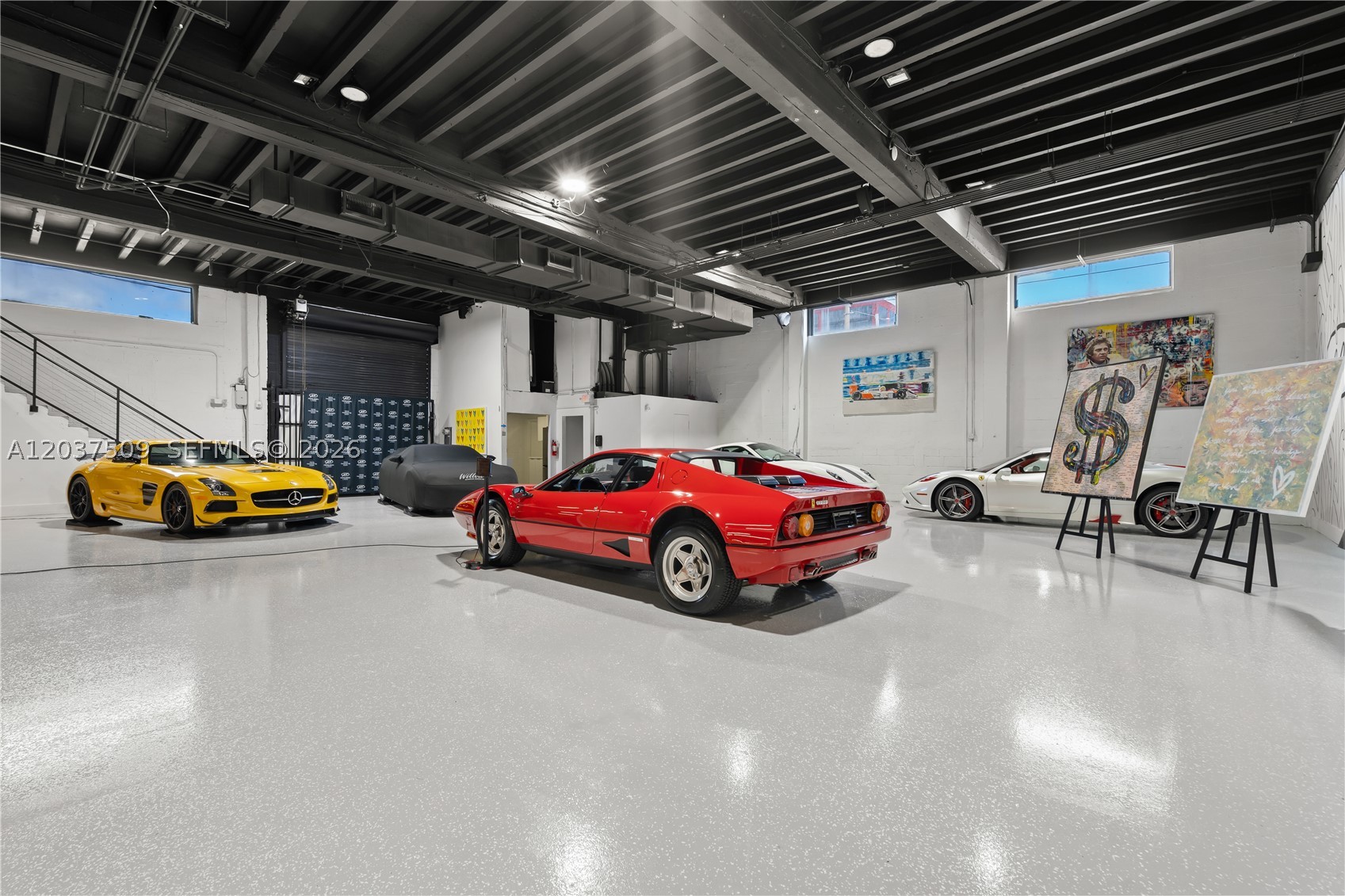 Position your brand at the forefront of Wynwood’s creative and commercial movement with this iconic mixed-use corner property—ideal for a flagship concept or next-generation HQ. With 9,685 SF of adaptable space, this building delivers the infrastructure, scale, and identity today’s top operator's demand.
Designed for versatility, the interior features 18-ft ceilings, expansive open areas, and abundant natural light—ideal for executive offices, media production, experiential retail, schools, co-working, wellness concepts, or hybrid creative operations. The layout transitions effortlessly from workspace to showroom to studio.
Key features include:

14 private offices 
2 bathrooms
Kitchenette
Fully built-out recording/podcast studio
Brand-new A/C system
CBS construction + concrete floors
4 assigned parking spaces + street parking
Fenced and gated security
Secure your flagship location in Wynwood. This price reflects the 1st floor only.  
Tour today and claim your place in Miami’s most dynamic creative corridor.