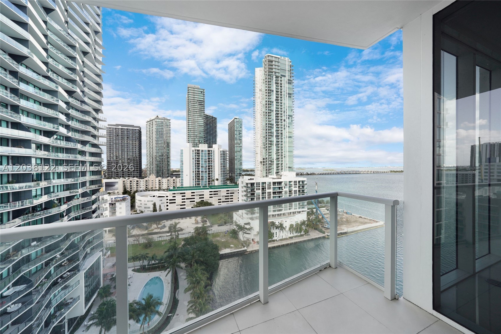 Step into luxury living at The Crimson, a LEED Gold-certified bayfront gem in the heart of Edgewater. This eco-friendly haven offers abundant natural light and materials designed for a healthier lifestyle. With 2 expansive balconies, indulge in breathtaking sunrise water views and dazzling sunset cityscapes. Minutes from Wynwood, Design District, Miami Beach, and Brickell, you're perfectly positioned to enjoy Miami's vibrant culture. Inside, find a fully upgraded open kitchen with s/s Bosch appliances, perfect for culinary enthusiasts. The Crimson boasts state-of-the-art amenities: a waterfront fitness center, pool, jacuzzi, waterfront Cyber Cafe, and a private movie theater. Experience elevated living with unmatched style and sustainability!