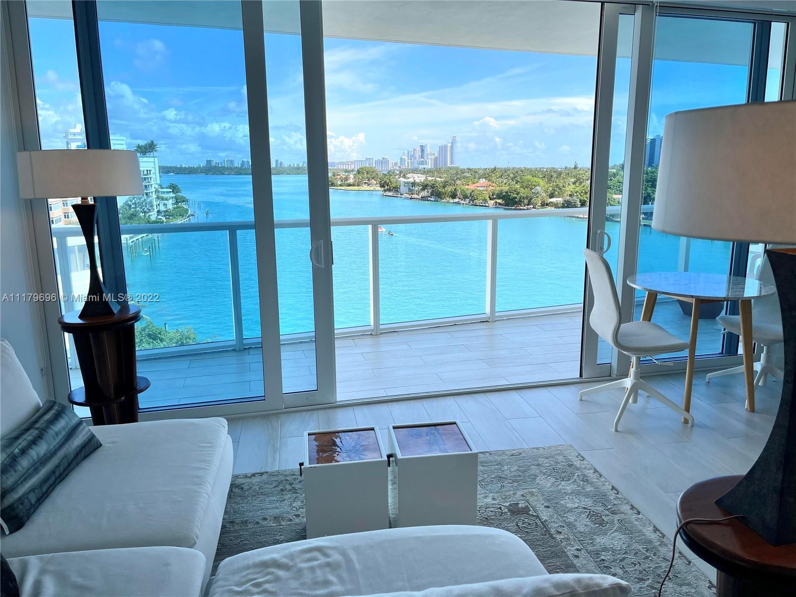 BUILDING directly on the bay in BAY HARBOR ISLANDS. Fantastic open bay views from master bedroom, living room and open kitchen. Real wow factor! The 2 bedroom 2 bath comes with Viking appliances quartz counter tops & washer and dryer. The floors are beach wood porcelain including the 200 sq/ft balcony. Building features Boat dock for pickup, large gym, 2 pools (east & west), sauna and security, 2 assigned parking and storage. Blackout shades in the bedrooms. Close to the beach, Bal Harbour Shops, Surfside shops & restaurants.