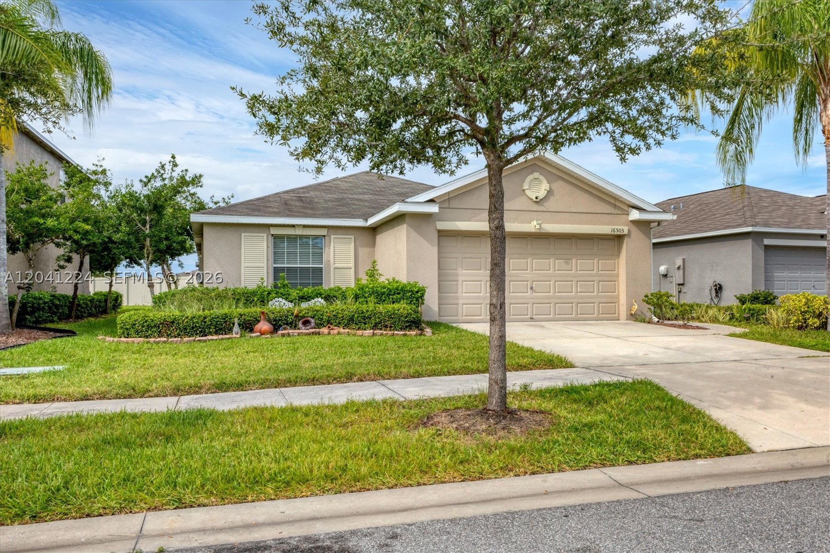 Welcome to this beautifully maintained single-story home in the desirable Vista Palms community of
Wimauma. Built in 2016, this 4-bedroom, 2-bath residence features an open-concept layout ideal for
everyday living and entertaining. The modern kitchen overlooks the living and dining areas, while
vaulted ceilings and a split floor plan add comfort and functionality. The private primary suite
includes an ensuite bath and ample closet space. Residents enjoy resort-style amenities such as a
clubhouse, fitness center, pool, playground, pickleball courts, and walking trails. Conveniently
located near shopping, dining, and major commuter routes, this home is perfect for homeowners or
investors. Newly installed solar panels on the roof.