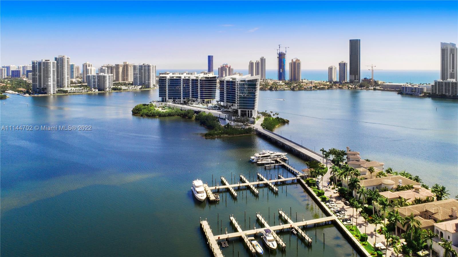 Come see this mansion in the sky! OWNER FINANCING AVAILABLE. Beautiful 4BED/4.5BATH located on South Florida's last private island. This 2-story Penthouse unit offers gorgeous views of the ocean and intercoastal, includes 4,446sq/ft  of interior space and 2,595 sq/ft of terrace.  Rooftop deck area for entertaining with pool, 2 summer kitchens and 15ft ceilings.  Amenities include: private beach,24 hour security, 5 star concierge, private gatehouse entry, on-site restaurant, full time concierge, marina, pier, 20,000 sq/ft of spa and gym, 2 lap pools, social room, cigar room, wine cellars, teenage room, tennis court, children's playground, valet parking, private docks available and full service marina for yachts up to 150'.