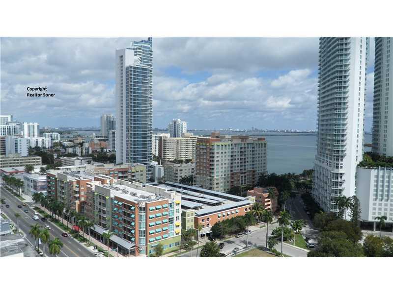 Trendy SoHo-style loft with 11'ceilings and nice NE bay views,all floors are polished concrete.Large kitchen with kitchen island.Full size Washer/dryer in unit.CITE is a full-service condo offering 24/7 concierge,valet,security and relaxing amenities such  as beach-style-pool,jacuzzi,large gym,club room w/pool billiard,business lounge w/free internet 24/7,fine retail on premises. Located in Miami's hot East Edgewater, walk to park,shopping and dining. Close to Downtown,highways,beaches,hospitals,airport.