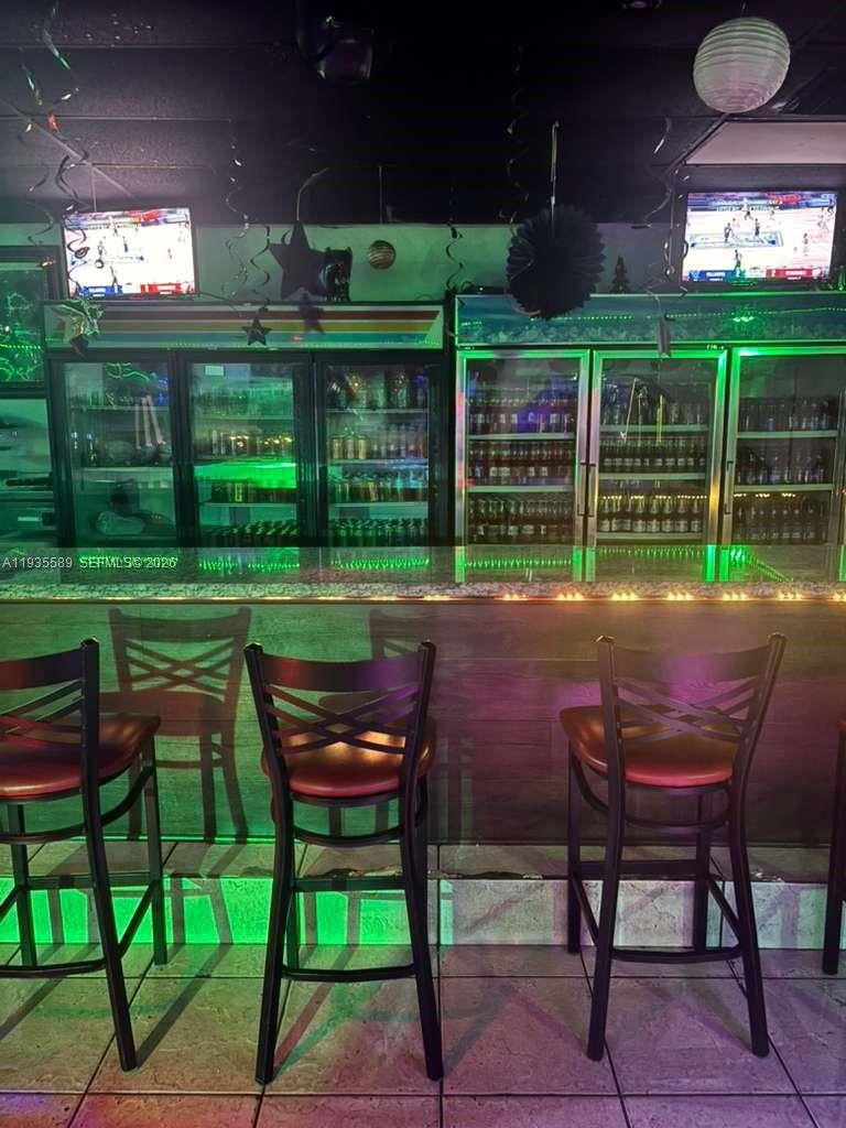 ?

Prime Business Opportunity – Fully Equipped Bar/Restaurant.
Turn-key bar/restaurant featuring 2,700 SF under A/C with a modern layout and vibrant atmosphere ideal for nightlife and entertainment concepts. The space includes a fully built bar, seating area, two billiard tables, LED ambient lighting, and multiple TV screens suitable for sports, events, or live entertainment.

The property offers approximately 12 on-site parking spaces, providing convenient customer access. The functional floor plan allows for operation as a bar, lounge, sports bar, or entertainment-focused restaurant, offering strong income potential.

Ideal for investors or owner-operators seeking a ready-to-operate business with excellent presentation, established infrastructure, and high commercial appeal.