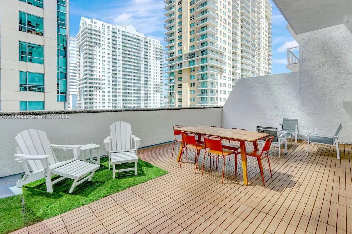 INVESTOR'S OPPORTUNITY! Welcome to your investment Airbnb approved condo with Bay views! This remodeled unit offers a perfect blend of luxury, flexibility, and income. What sets this condo apart is its unique split bedroom design. The original 1 bedroom layout has been transformed into 2 bedrooms, providing versatility for guests. This unit also features 12 ft ceilings! Higher than the units on other floors providing an airy and bright atmosphere throughout. Another standout feature is the significantly larger balcony. Whether you're looking for a peaceful retreat or an ideal space for entertaining, this expansive outdoor area provides the perfect setting. For investors seeking more, the option to purchase together with a 3-bedroom unit in the building creates a 5-bedroom investment condo.