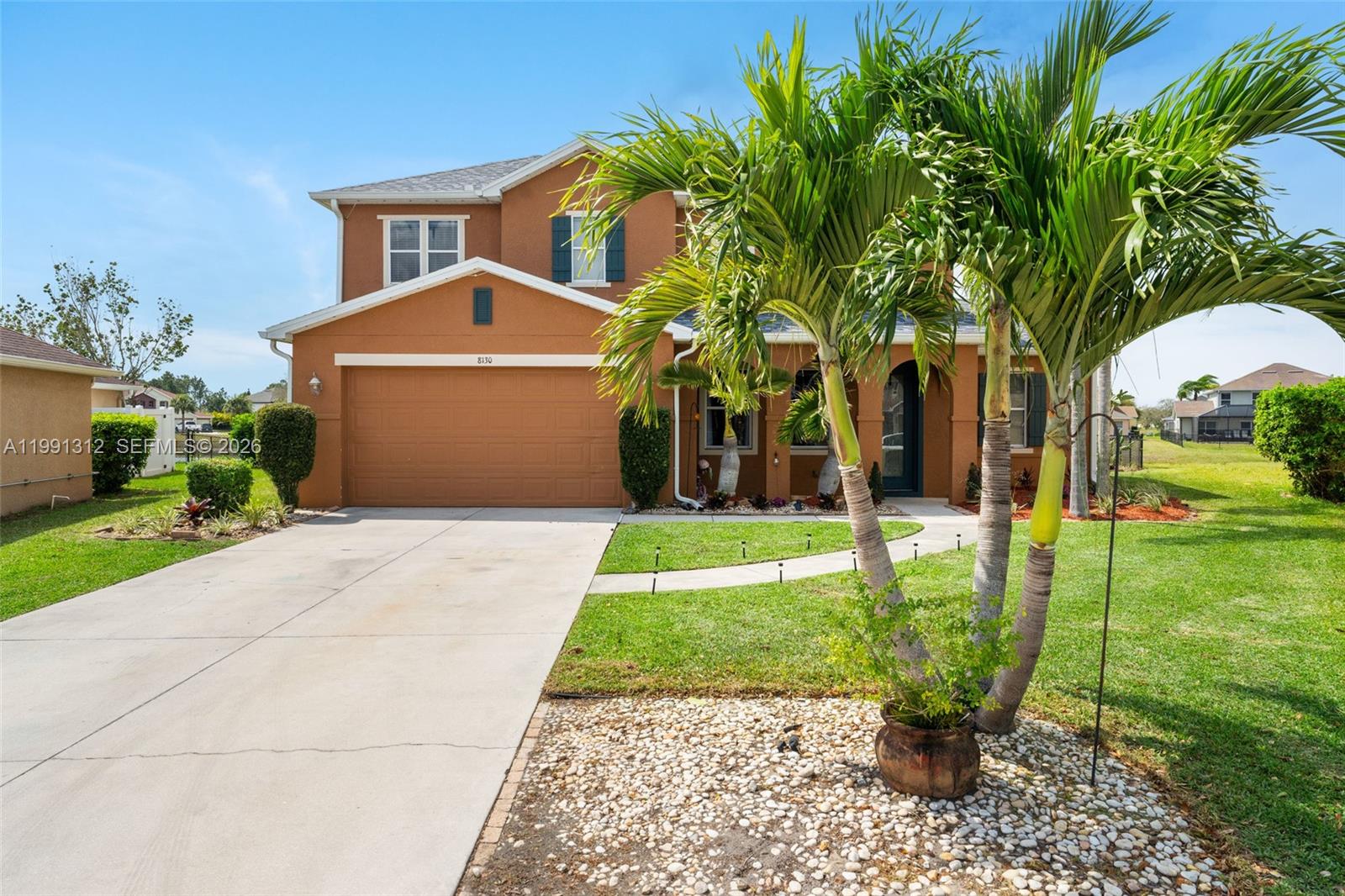 WELCOME TO 8130 BLUE DAZE COURT—A HOME THAT FEELS LIKE VACATION EVERY DAY! Wake up to peaceful lake views in this spacious two-story home in the gated community of Town Lakes. With over 2,900 square feet, 4 bedrooms, and 2.5 baths, there’s room for everyone to spread out and enjoy. The large master suite on the ground floor features dual sinks, granite countertops, and a walk-in closet. Upstairs, three oversized bedrooms—each with walk-in closets—surround a generous flex space, perfect for a playroom, office, or media room. The fully fenced backyard offers plenty of space for outdoor living, whether you're hosting a barbecue or simply soaking in the Florida sunshine. Situated on a quiet cul-de-sac with low HOA fees, this home provides the perfect balance of comfort and convenience. With easy access to I-75, Southwest Florida International Airport just 30 minutes away, and Lehigh Park within a mile, everything you need is close by. Don’t miss your chance on this one!