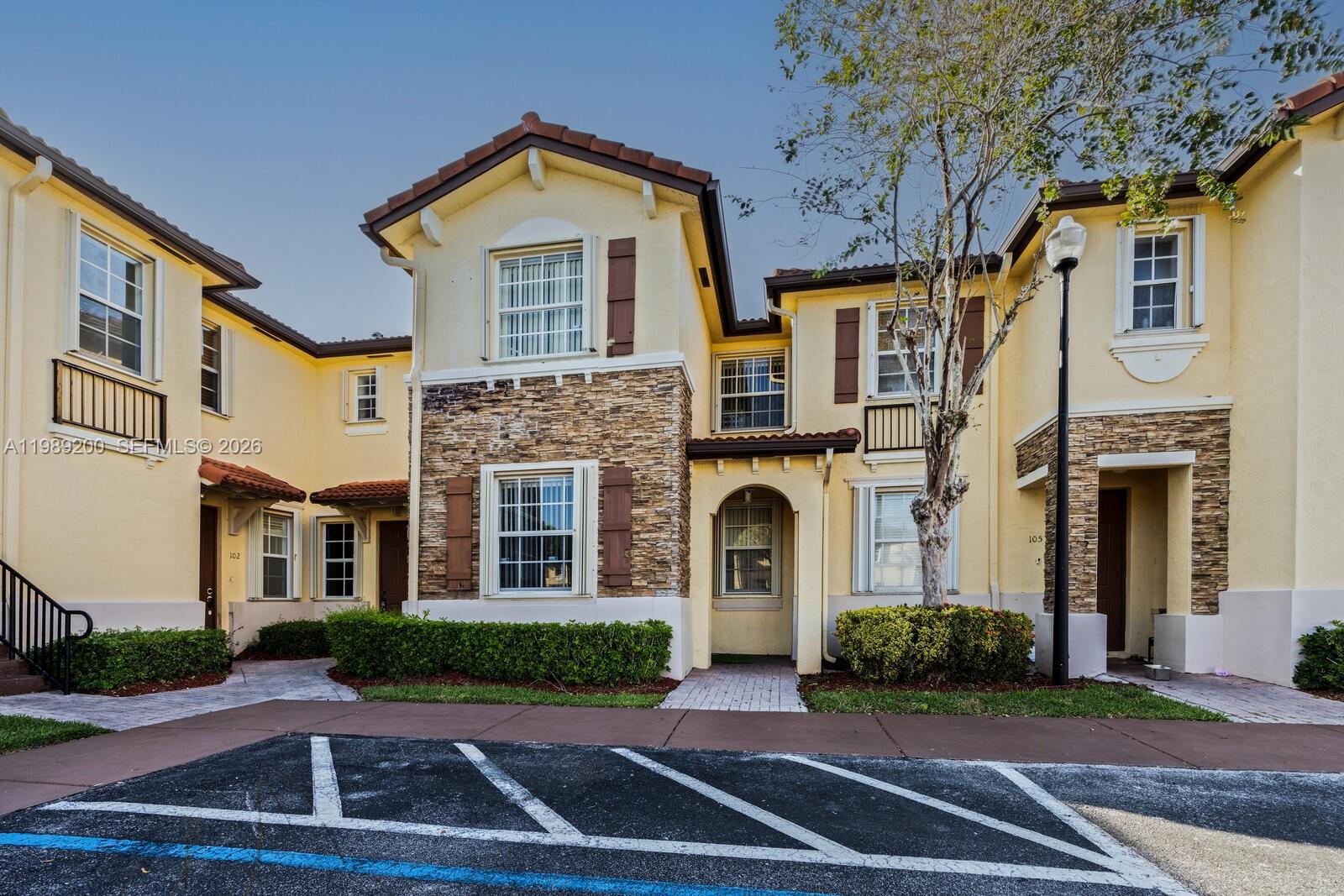 Spacious two-story townhouse offering a bright and inviting layout filled with natural light. This unit features a combination of tile and laminate flooring throughout for easy maintenance and modern appeal. Located in a desirable community with excellent amenities including a clubhouse, pool, gym, and play area for residents to enjoy. Ideal for investors or end users alike, this property offers strong rental potential in a prime location. Conveniently situated near major highways, dining, and shopping, providing easy access to everything you need. A fantastic opportunity you don’t want to miss!