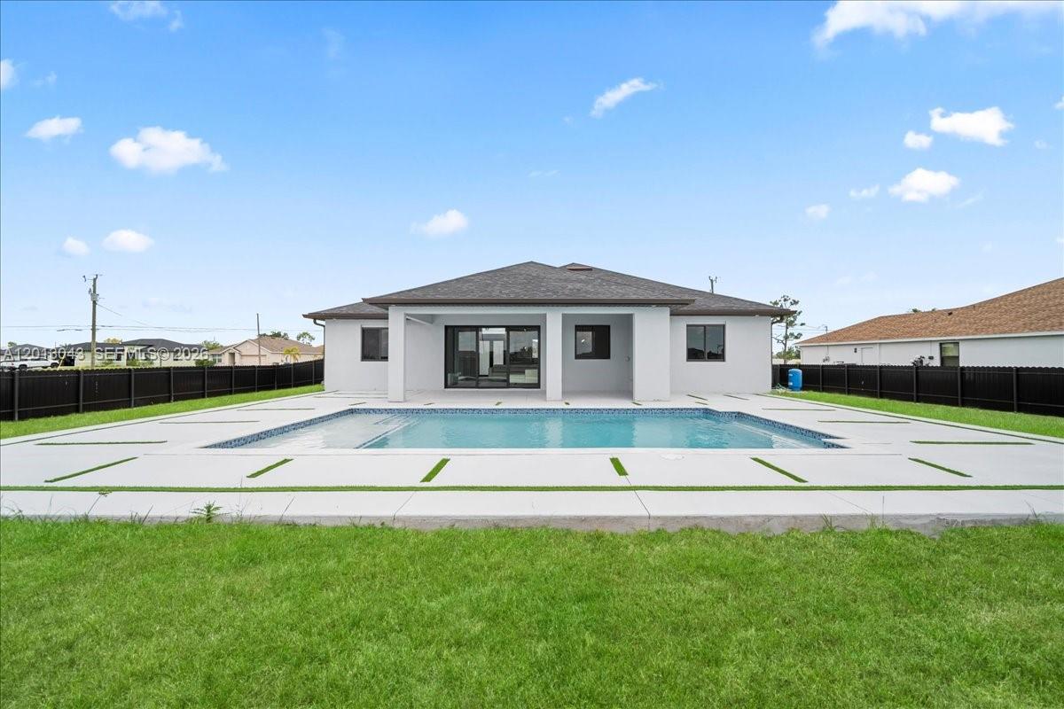 Beautiful 3-bedroom, 2-bath home situated on an oversized lot in a desirable area of Cape Coral. This property features a spacious layout with a 2-car garage, a private fenced yard, and a stunning pool—perfect for outdoor living and entertaining. Enjoy plenty of space for family, pets, or future upgrades. Ideally located just minutes from a nearby golf course, as well as shopping, dining, and major roadways. Perfect as a primary residence, vacation home, or investment opportunity.