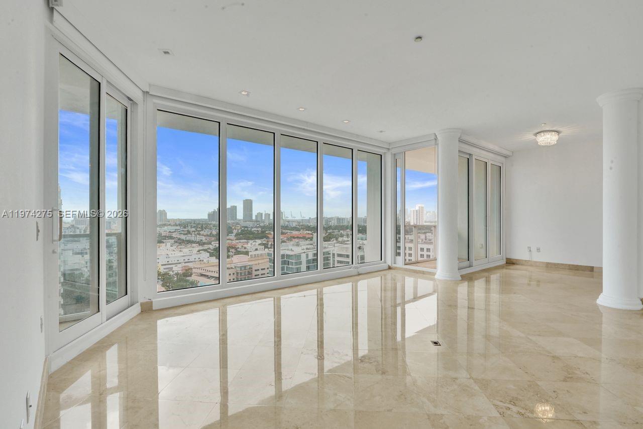 This oceanfront building penthouse in the sky boasts 1,490 square feet of living space with two bedrooms and two bathrooms, featuring a spacious layout with floor-to-ceiling hurricane impact windows that provide stunning city and sunset views. The ceilings super height, create a bright and airy atmosphere. The primary bedroom is a spacious retreat with ample natural light and views. The en-suite bathroom offers a relaxing oasis. The additional bedroom can be utilized as a home office, guest room, or personal sanctuary. The well-appointed bathrooms are finished with high-quality materials, ensuring a comfortable and modern living experience. The expansive windows throughout the home allow for an abundance of natural light, highlighting the unit's open-concept layout. The thoughtful design and premium finishes create a refined and sophisticated ambiance. Residents can enjoy the convenience of the property's proximity to the vibrant Lincoln Road Mall, providing easy access to a diverse array of retail, dining, and entertainment options. Monthly HOA includes all utilities: water, wifi high speed internet, cable TV, electricity, reserves. Amenities: heated infinity pool, direct beach access, children's play room, game room, library, fitness center, 24hrs front desk & security, bike storage, valet parking, zen garden, sun deck, and 2 parking spaces! Potential for renting month to month or 12 leases per year. Priced to sell. Call now for an exclusive showing.