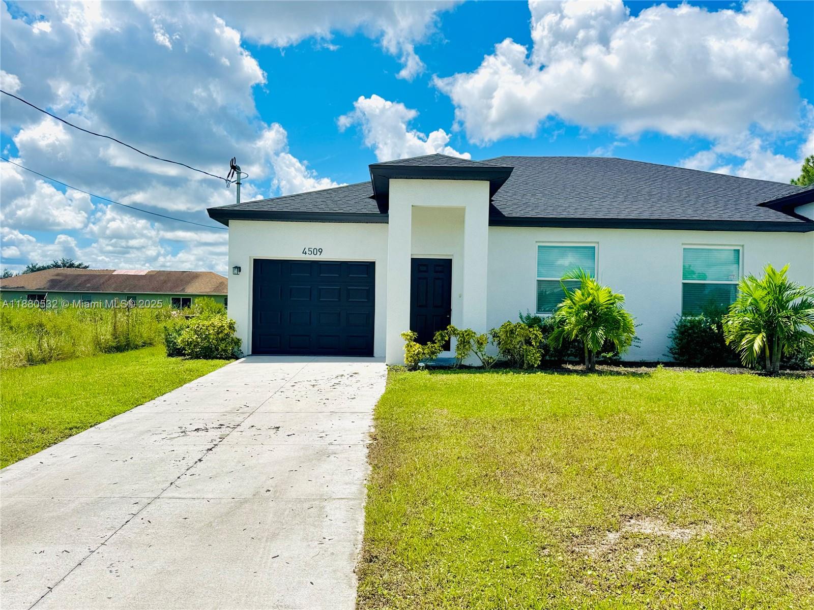 REWARD for tenant! $500 off if tenant signs within the next 7 days. Welcome to this beautiful newer construction home located in the heart of Lehigh Acres. This property offers 3 spacious bedrooms, 2 full bathrooms, and a 1-car garage. The home features a modern open floor plan with plenty of natural light, a stylish kitchen with contemporary finishes, and comfortable living spaces perfect for entertaining or relaxing. Additional highlights include: Move-in ready condition, Convenient single-level layout, Well-sized lanai and backyard for outdoor enjoyment. Great location with easy access to shopping, dining, and main roads. This rental is perfect for those seeking comfort, convenience, and modern living.