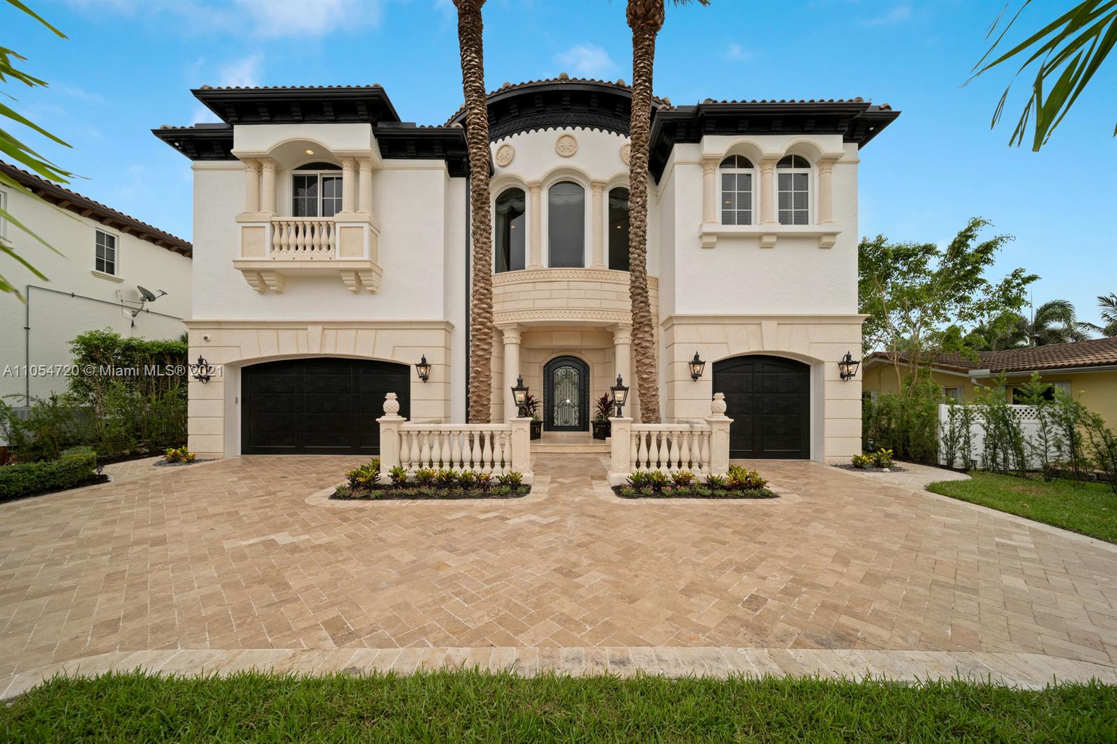 Magnificent newly renovated direct waterfront estate professionally decorated. Features hurricane impact doors, windows, and whole home generator. Stunning island kitchen with beautiful stone countertops. Viking ovens ranges & Pro Sub Zero. Dining room with impressive wine room and Sub Zero wine fridge. Living room with 28 ft. coffered ceilings and designer chandeliers. There is a custom elevator. Second floor master bedroom with incredible master bath spa tub double shower & private balcony overlooking the waterway. His & her closets with custom built ins and bullet proof watch & jewelry safe. Fully custom security system with cameras. Upstairs are 3 en-suite bedrooms one is used as a fantastic mirrored gym and private balcony. Custom Venetian plaster throughout house. No expense spared