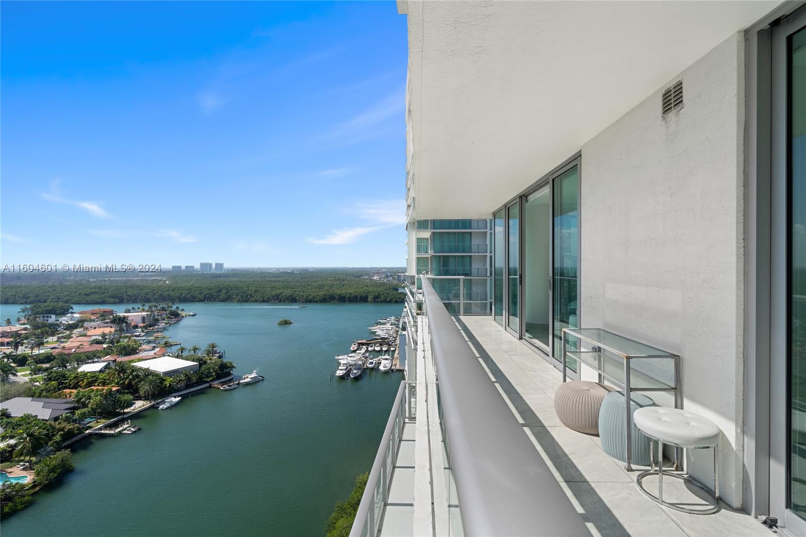 Sunny Isles on Intercoastal. Real full-size 3 bedrooms, 3 full bathrooms, and 1/2 guest bath. Each bedroom has its bathroom. All rooms have porcelain floors. Beautiful southwest views from each room. The living room and master bedroom have stretch ceilings. All rooms have custom closets. All interior doors were replaced. Spacious wraparound balcony overlooking the Intracoastal Waterway. The unit comes with storage space, 2 assigned tandem parking spaces + complimentary valet. Top-of-the-line amenities include a fitness center, yoga and aerobics room, movie theater, business center, tobacco room, three swimming pools, and children's play area. Low HOA fees.