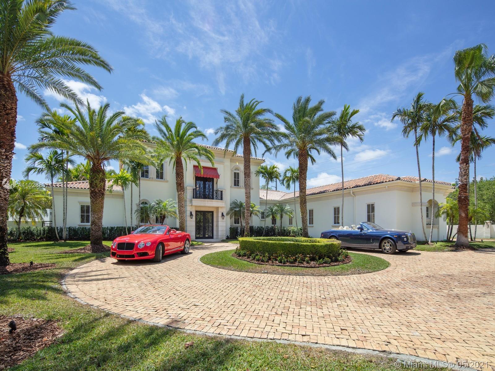 Impressive one acre + custom estate located in Prime North Pinecrest. This magnificent 11,046 sf home offers a grand foyer entrance and staircase featuring high ceilings, large living areas, gourmet kitchen with Butler's pantry, wine cellar, Thermador appliances and breakfast area. Private Master suite located on ground floor with sitting room, walk-in closets, spa like bath and an outdoor jacuzzi. Discover ample room to entertain family and friends with a huge game room with wet bar and access to a backyard oasis featuring spectacular pool/spa, covered patio, and built-in summer kitchen. Additional Features: upstairs junior suite, office, service quarters, full house generator, surround sound, Crestron/Lutron system, 4 car garage.