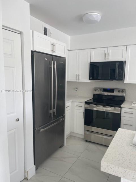 Excellent opportunity in the heart of Doral, completely remodel, new appliances stainless steel, ready to move in, near to turnpike, for showing call listing agent.