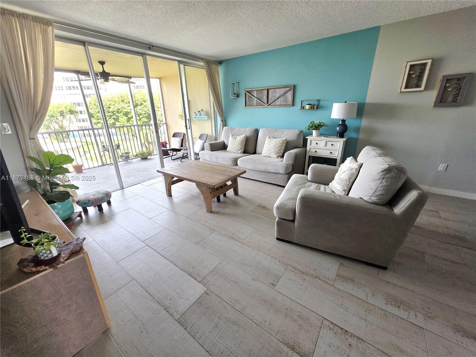 Don’t miss this rare opportunity! Spacious and beautifully updated 2/2 in a prime location, close to Aventura Mall, Brightline Station and beaches. Featuring porcelain floors, hurricane impact windows, stainless steel appliances, walk-in closet and modern bathrooms. Additional upgrades include a new A/C unit and water heater. The large screened-in balcony overlooks the garden, pool and lake. Pet-friendly building, it comes with storage unit, laundry rooms on each floor, assigned parking, 3 pools, 24/7 security and gated access. Rentals are allowed after 1 year.HOA fee includes internet and cable.
The building has undergone major improvements:new roof, generators, new elevators, upgraded lobbies, new hallway windows. This December the condominium will complete the 40/50-year certification.