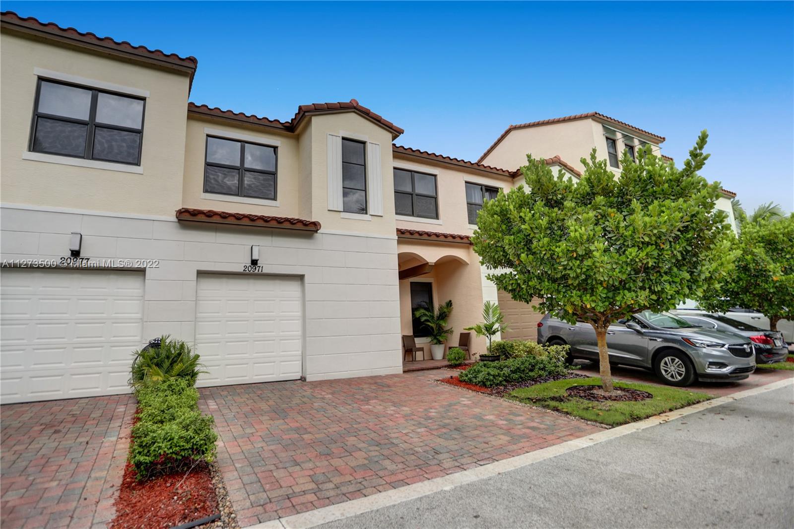 Amazing model townhouse in desirable location in West Pembroke Pines. Townhouse features 3 bedrooms, 3 bathrooms with potential for a 4th bedroom/office/den, 1 car garage. New kitchen with granite countertops, stainless steel appliances and many designer touches.  Ceramic tiles throughout the first floor, carpeted stairs and bedrooms. Hurricane impact windows are already installed and pre-wired smart home technology as well. The community offers nice amenities: walking distance to the pool with hot tub, and fitness center and enjoy the basketball court. It's a gated community within close proximity to many restaurants and West Broward High School. You can even walk to your own post office location right next to the community.