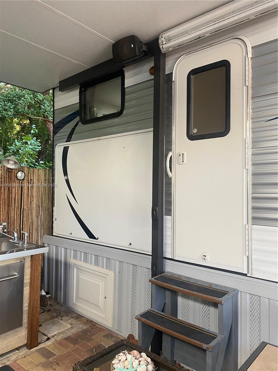 Beautiful RV home in the desired area of Calusa Campground. Manny amenities in the community, boat ramp, community pool, overnight docking, playground, basketball court, and many more. Short rents are allowed with Airbnb and Vrbo. Already registered with those apps getting generous monthly income. .This is an corner lot with space where to park a boat.
