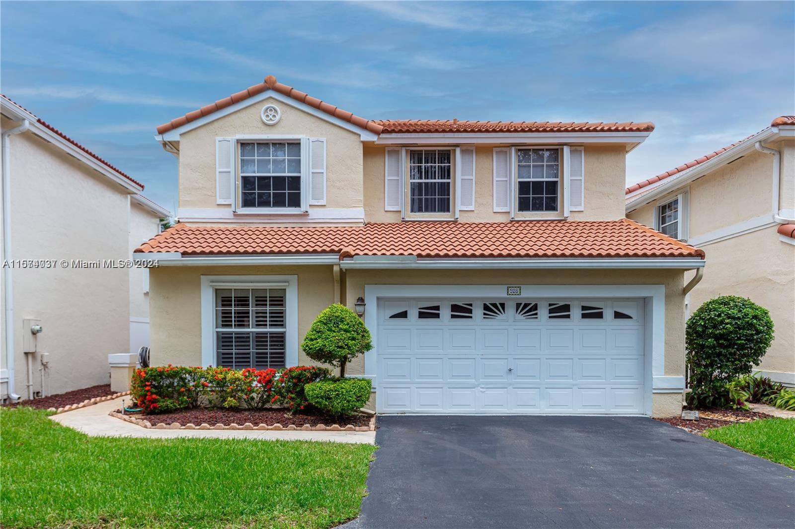 Immaculate 4 bedrooms, 2½ baths in charming Emerald Isle gated community. Home features renovated wood kitchen cabinets, granite countertops, new refrigerator. Open floor plan, lite & bright with clerestory windows, soaring ceiling. Ceramic flooring throughout. Modern window treatments in living areas and blackouts in bedrooms. All bathrooms have been renovated with custom wood vanity & granite tops. California style closets. Courtyard style entrance, fully fenced and screened large backyard. Located in the hearth of Weston, walking distance to Indian Trace Elementary and Tequesta Middle school.