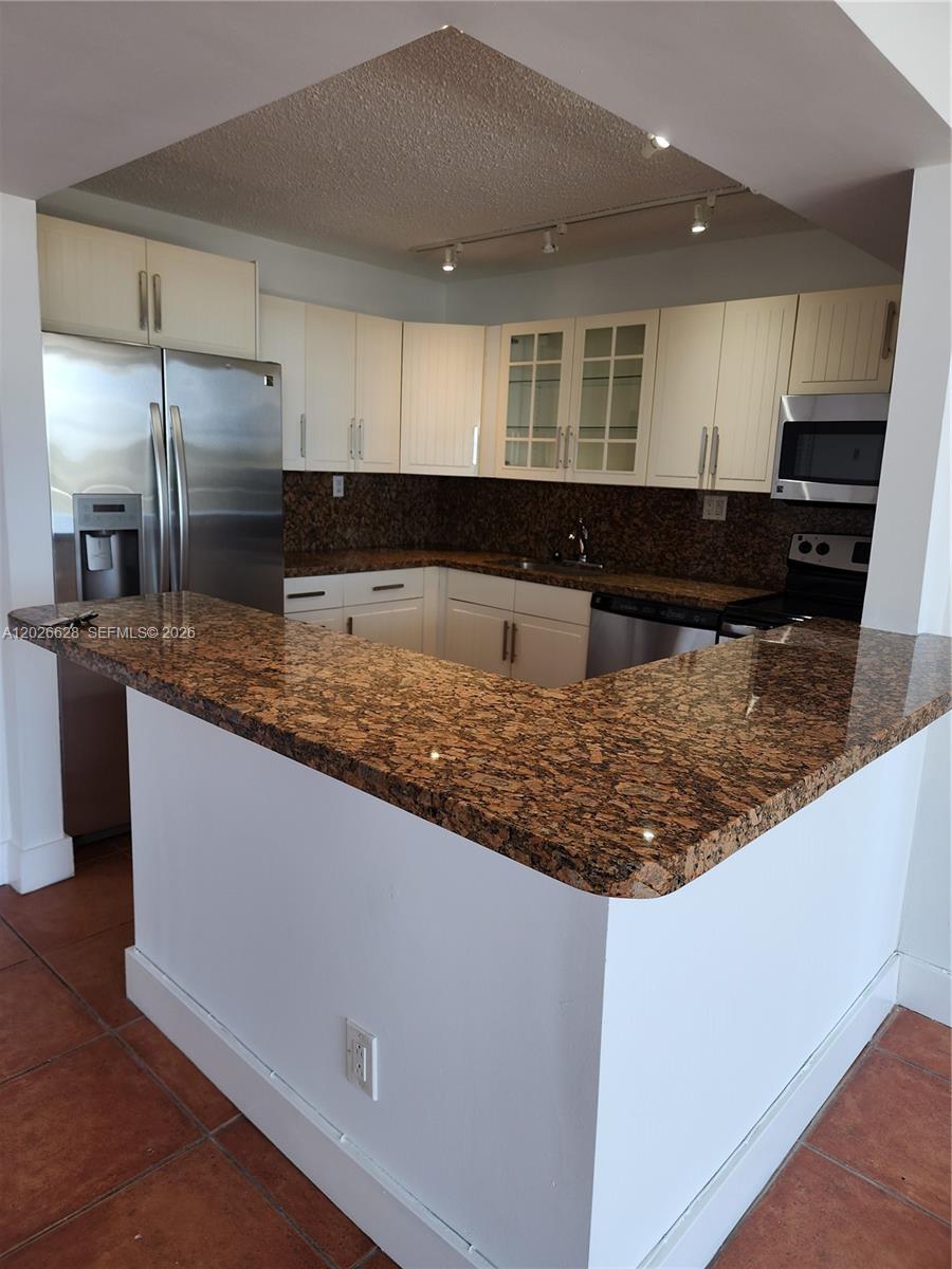 REEF EAST CONDO - Residential