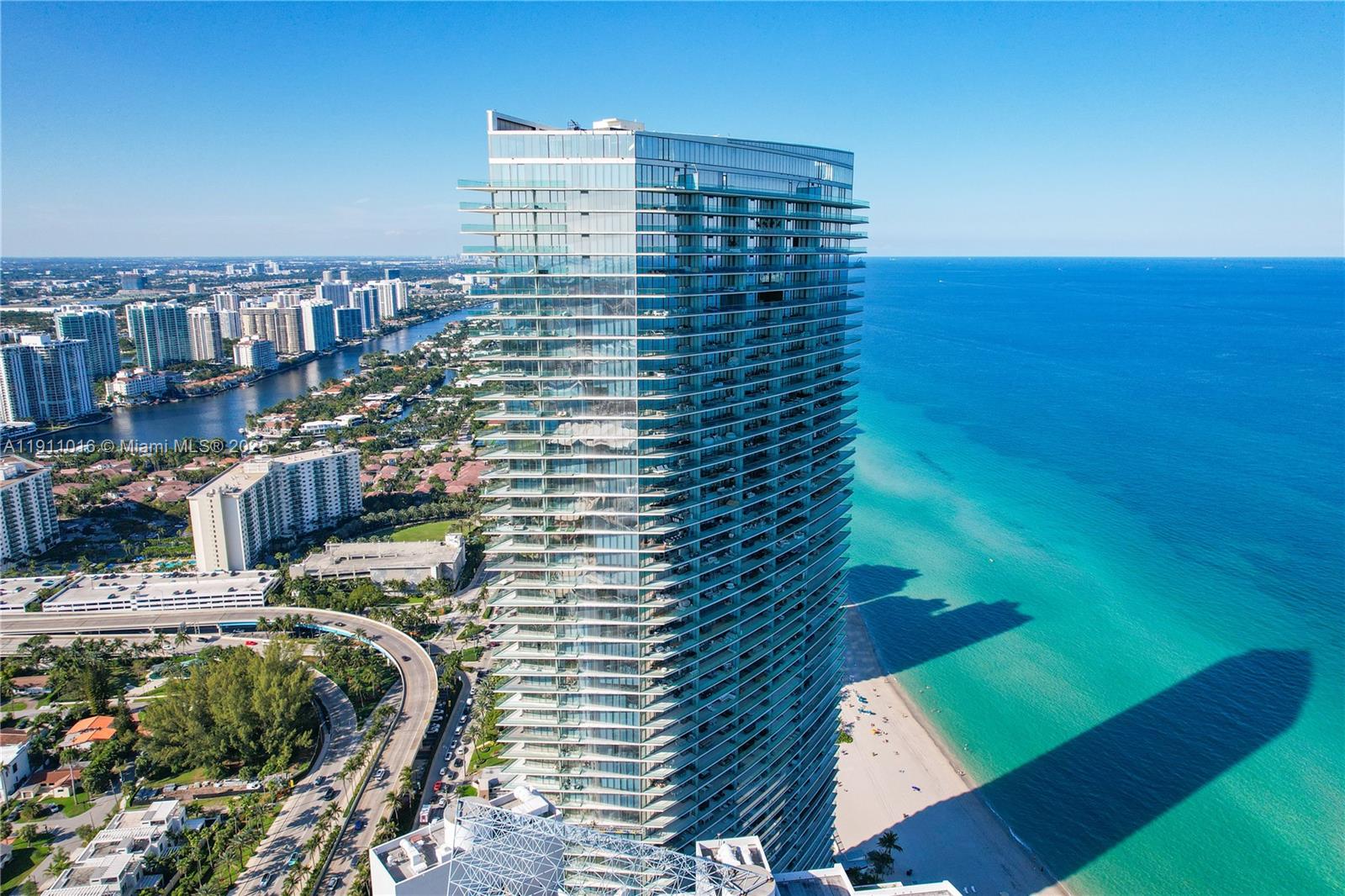 Spectacular Direct Ocean & Intracoastal Views from this, 2-bedroom 2 bath Armani Casa masterpiece! Corner Unit, Wrap around balcony. Floor to ceiling glass windows. Armani designed a modern kitchen with top-of-the-line Wolf Ovens, Cooktop & Espresso Machine, Sub-Zero Refrigerator & Wine Cooler. Spectacular luxury amenities: Oceanfront Resort Style Pool, Beach Service, Restaurant, Coffee Bar, State-of-the Art Fitness Center, 2 Story Spa, Children's Play Lounge. Exclusive luxury living at the finest!