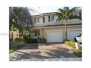 Lovely 3 bedroom, 2.5 bath Townhouse with laminate flooring downstairs.  Single garage with attached garage opener. All large rooms with extra windows, very bright and light. This is the larger corner model.  Master bedroom has new corner shower with granite counter top wood vanity. Full size washer and dryer. Community offers pool, tot lot, fitness center and so much more.