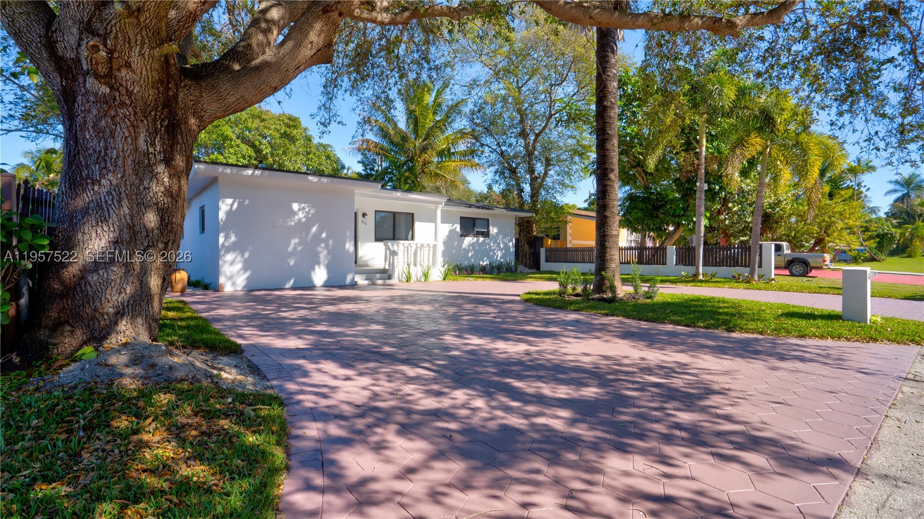 This move-in ready 3BR/2BA home was designed with family living in mind. The split-bedroom layout offers privacy for all, with a spacious primary suite set apart featuring a large bathroom with double sinks & a beautiful modern shower. Enjoy a generous living & dining area + a versatile spare room ideal for a family room, playroom, home office, or study. The modern kitchen showcases brand-new cabinets & stylish countertops. Additional highlights include a large laundry room with washer and dryer hookups. New electric water heater, new sprinkler system, and New impact windows and doors throughout. Relax or entertain in the covered patio with recessed lighting perfect for BBQs and gatherings with family and friends. A wonderful place to call home, just beautiful remodeled with permits. As per the owner, the property has passed the master permit and is ready to close.