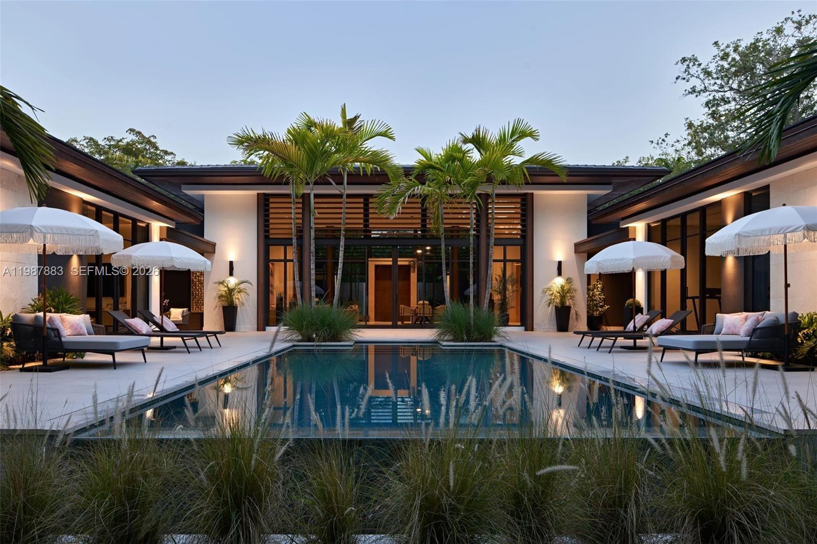 One-of-a-kind luxury home in the highly sought-after neighborhood of North Pinecrest. Designed by award winning architect/designer Thomas Diverio and featured nationally in Florida Design magazine, this custom-built new construction single-family home boasts luxury and elegance at every turn. As you drive up to the property, you are greeted by a stunning facade and lush landscaping. A water feature welcomes you inside only to be greeted by a large great room with 18-foot-tall ceilings and custom millwork. 

The home has an open concept gourmet kitchen, complete with Subzero/Wolf appliances, custom cabinetry, and an island.  The expansive living room features a walk-in wine cellar and floor-to-ceiling windows, flooding the space with natural light. The master suite has a luxurious bathroom, custom walk-in closet, and private outdoor spa. The home also features a dedicated office.

The home has a soundproof theater for movie nights, a spa for relaxation, and a wine cellar for the wine enthusiast.  The outdoor area is a true oasis, with covered patios, a full outdoor kitchen, covered outdoor dining, and a sparkling infinity pool surrounded by privacy and lush landscaping. The property has a brand-new pickle ball court and three car garage with a dedicated music studio, attic, and storage room. The detached guest house provides an additional two bedrooms/baths for visitors.