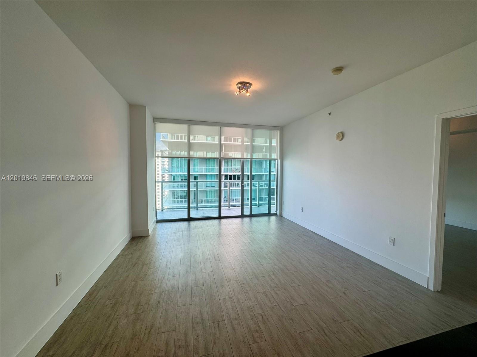 OWNER MOTIVATED.  Remodeled 2/2 plus Den with "wood like" tile. Includes 2 SINGLE ASSIGNED PARKING SPACES and a STORAGE. Perfect for an end-user or investor. Floor to ceiling glass, large balcony, roller shades and large den that can be used as an office, separate room or formal dining area. Building has 2 pools, State of the art gym, billiard room, party room with large TV, 24 hour security and concierge. Most convenient location in Brickell. Walk everywhere or hop on the Metrorail- or people mover. Tenant moving out on 7/4/26.