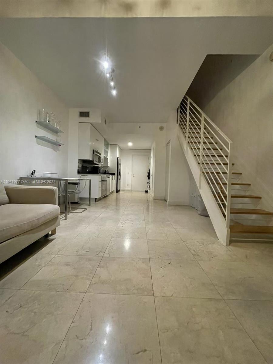 INFINITY AT BRICKELL COND - Residential Lease