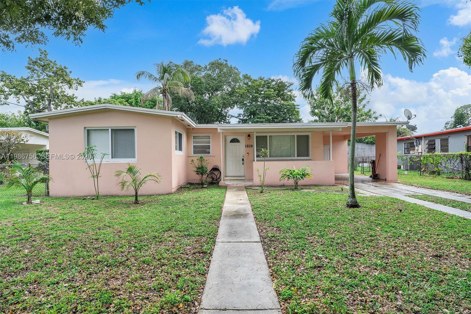 This property presents a compelling investment opportunity with strong potential for value enhancement through thoughtful updates and personal touches. The home offers 3 bedrooms and 2 bathrooms across 1,068 square feet of living space, complemented by a covered front porch and an open backyard patio—ideal for outdoor enjoyment. The lot features a good-sized, partially fenced yard, along with a concrete parking strip accommodating two vehicles and an attached carport with additional storage. Additional highlights include a shingle roof, central A/C, and the freedom of no HOA restrictions, allowing for flexibility in use and improvements. Conveniently located near shopping, dining, Osswald Park, and Mill Pond Park, with easy access to Interstate 95, this property combines accessibility with opportunity—making it an excellent choice for investors or buyers looking to customize a home to their own style.