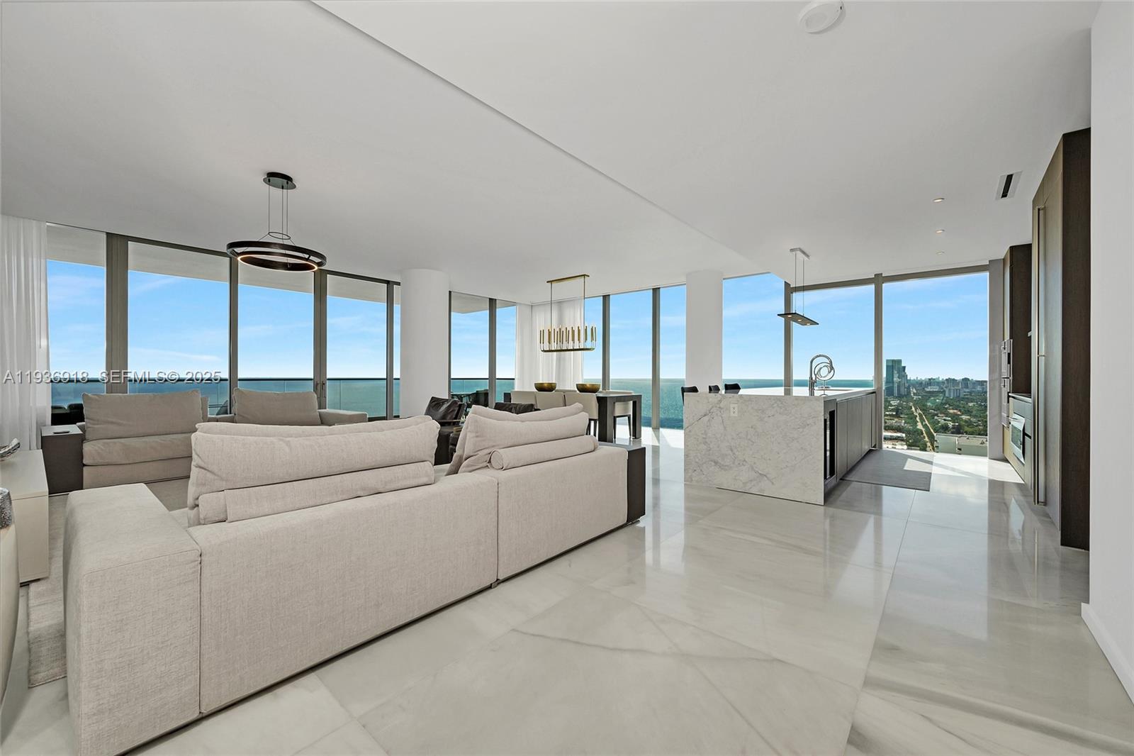 Seller motivated, Turnkey residence, South East corner on the 30th floor with a unique floor plan that offers bigger bedrooms than any other unit in the building including a linen closet. This 3Bed, 3.5 baths has the best panoramic views, completely unobstructed to Golden beach. Residence comes with high end furnishing as well as the highest upgrades like Marble floors, Boffi custom Kitchen and Shadetec window treatments throughout the residence that create a seamless blend of modern coastal luxury and refined comfort. Sitting directly on the sand enjoy stunning sunrise coffee and sunset lounging effortlessly from your residence. The building features 24 hr. concierge, facial recognition access, and resort style amenities that include beach service, an east and west pool decks, spa pavilion with a yoga studio, sauna, ice room and Gym.