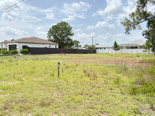 Attention builders and investors! Take advantage of this high-potential,RS-1 zoning Vacant Lot unimproved, residential, rectangular lot features paved road access, measuring approximately 10,759 sq.ft. Lot  (0.25 acres) in Southwest Lehigh Acres. Located in an established, non-gated community with no restrictions or active HOA fees, this RS-1 zoned property is ready for your next single-family home project. Enjoy a quiet neighborhood setting that remains just a short drive from local amenities, parks, and essential services. Buyer to verify all utility connections and building requirements.