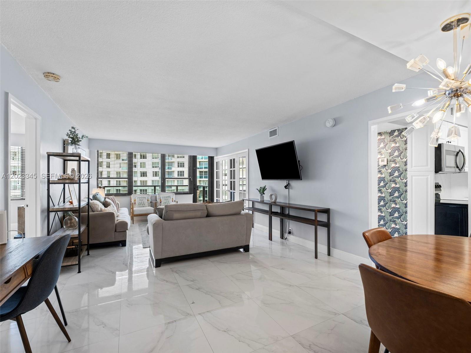 Oceanfront condo hotel on Miami Beach's iconic Collins Avenue. This fully furnished 2-bedroom, 2-bathroom residence on the 15th floor offers 960 SF of living space with stunning ocean and Intracoastal views. Located in a completely remodeled building with direct beach access and no rental restrictions. Ideal for investors or owner-occupants — rent through the hotel program, use an operator, list on Airbnb, or live in it full-time. The flexibility is yours. Maintenance fees include electricity, cable, A/C, Wi-Fi, and hot water. One assigned garage parking space included. Building amenities include two outdoor pools with tiki bar, beach service, spa, gym, full-service restaurant, cafe-bakery, bar, salon, mini market, maid service, valet parking, and event/wedding facilities.
An exceptional opportunity in one of Miami Beach's most sought-after oceanfront locations. Must see.