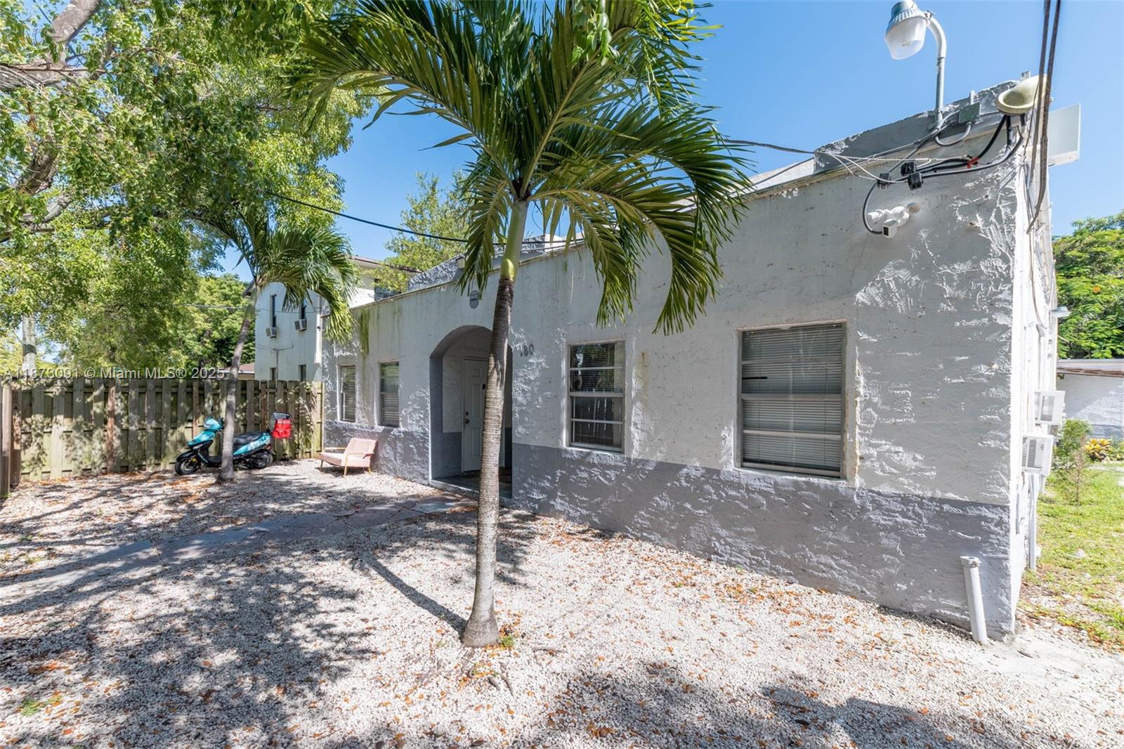 Located in a coveted Opportunity Zone, this 5-UNIT multifamily property boasts over $100,000 in permitted electrical & plumbing upgrades, ensuring reliable infrastructure. Zoned T-5-R, there's great potential for higher-density mixed-use development, allowing up to 5 stories with retail, office, and residential spaces—unlocking significant value appreciation. Durable concrete block construction, there is a mix of 1, 2, and 3-Bedroom units, each with separate electric meters for tenant convenience. Spacious front & back yards, perfect for making desirable common areas for potential new tenants. Not in a flood zone, this investment offers a strong cap rate, making it a rare find in Miami’s competitive market. Bringing rents up to current market will also dramatically improve your returns!