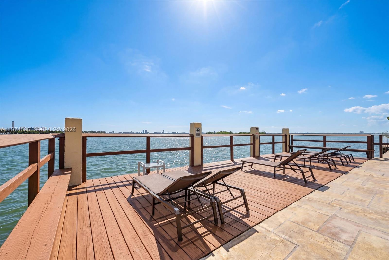 Completely reimagined and beautifully updated, this waterfront residence in a boutique bayfront building offers style, flexibility, and location in one compelling package. Flexible layout includes an enclosed second room that comfortably functions as a second bedroom, office, or den, or can be reopened to expand the living area. Recent renovations have elevated the unit with updated finishes and a fresh, modern feel throughout. Water views from the bedroom add to the appeal.

The building has undergone exterior improvements, enhancing curb appeal and long-term value. Residents enjoy a bayfront pool, secured entry, lush courtyard, water access, on-site parking, and the convenience of an in-unit washer and dryer. Located east of Biscayne Blvd, minutes to the beach, Upper East Side dining, North Bay Village, and Miami Beach. Ideal as a primary residence, second home, or investment with low maintenance fees.