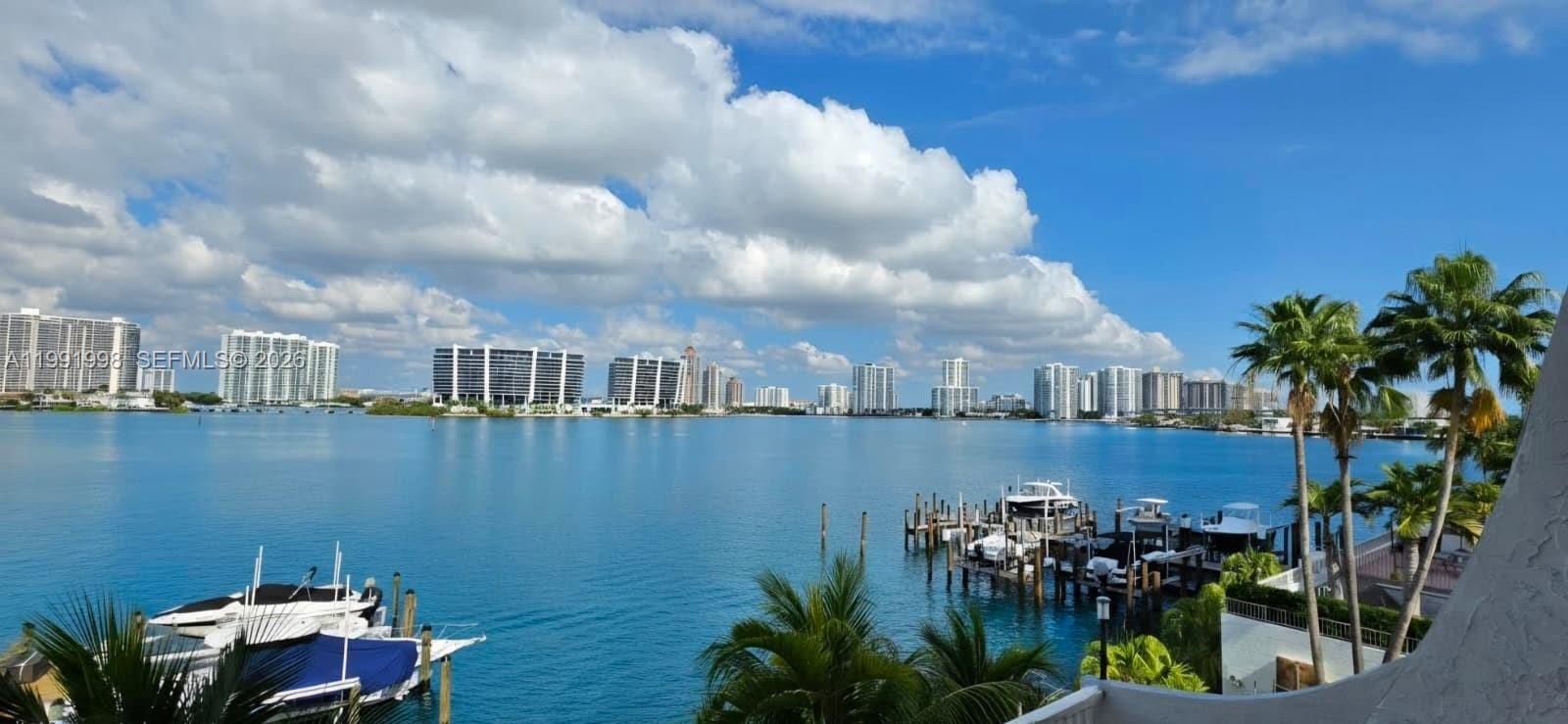 Intimate boutique style building located in the center of Sunny Isles Beach. Escape the hustle and bustle of the city as you relax on your lanai and watch the yachts go by. Flawless sunset views will greet you nightly.  No expense has been spared in this totally upgraded unit.  Remodeled from top to bottom inclusive, but not limited to closet cabinetry.  This lovely 45 unit building also offers boat dockage that can be leased from the building.  Peace and tranquility, although only steps away from all the action that Sunny Isles offers.  Steps to the ocean, shops, restaurants, and houses of worship and highly rated K-8 school
This unit also offers covered parking for up to two vehicle vehicles.