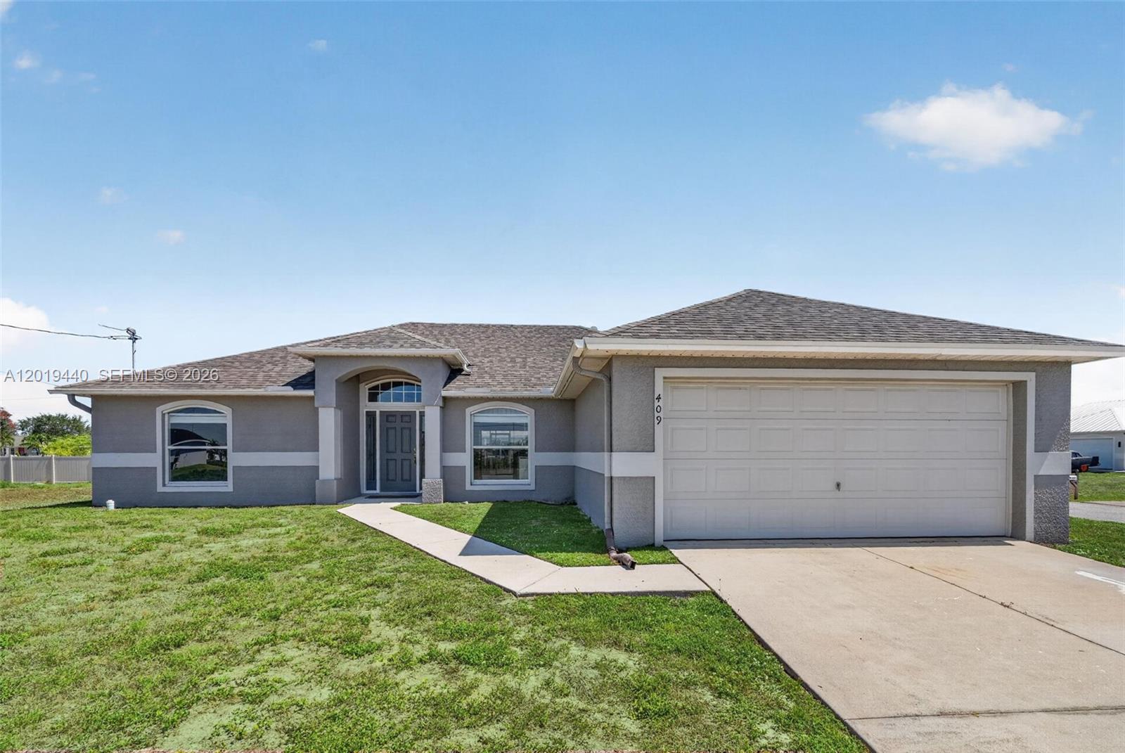 Beautifully RENOVATED 4BR • 2BA • 2-Car Garage • One-Story Home on OVERSIZED CORNER LOT! Move-In Ready & Stylishly Updated - This beautifully renovated 4-bedroom, 2-bathroom single-family home offers a bright open-concept layout, VAULTED CEILINGS, and MODERN finishes. The home sits on an over 1/4 acre corner lot w/room for a pool. INTERIOR HIGHLIGHTS *OPEN-CONCEPT layout w/VAULTED ceilings & natural light *SPLIT bedroom floorplan for privacy *Primary bedroom suite has a large WALK-IN CLOSET, GRANITE countertops, modern fixtures, DOUBLE SINK, separate tub & shower and PRIVATE toilet closet *NEW Lifeproof wood-look flooring seamlessly throughout *Neutral color palette, MODERN light fixtures & recessed lighting *Welcoming foyer entry *Spacious EAT-IN kitchen w/GRANITE countertops & new Frigidaire stainless steel appliances *Oversized double sliders leading to the covered, screened-in patio. MAJOR UPDATES for Peace of Mind *Roof (2023) *Water heater (2023) *Water pump (2024) *Updated finishes & modern touches throughout. OUTDOOR LIVING *Enjoy Florida living on the covered screened-in patio, overlooking the expansive CORNER LOT w/plenty of space to design your dream backyard or add a pool. PRIME LOCATION *Minutes from beaches, boat ramps, & outdoor recreation. Close to schools, parks, medical facilities, restaurants, retail, parks, & waterfront activities. This light & bright, updated home is perfect for buyers seeking a MOVE-IN-READY property w/strong value. *NO HOA *X FLOOD ZONE