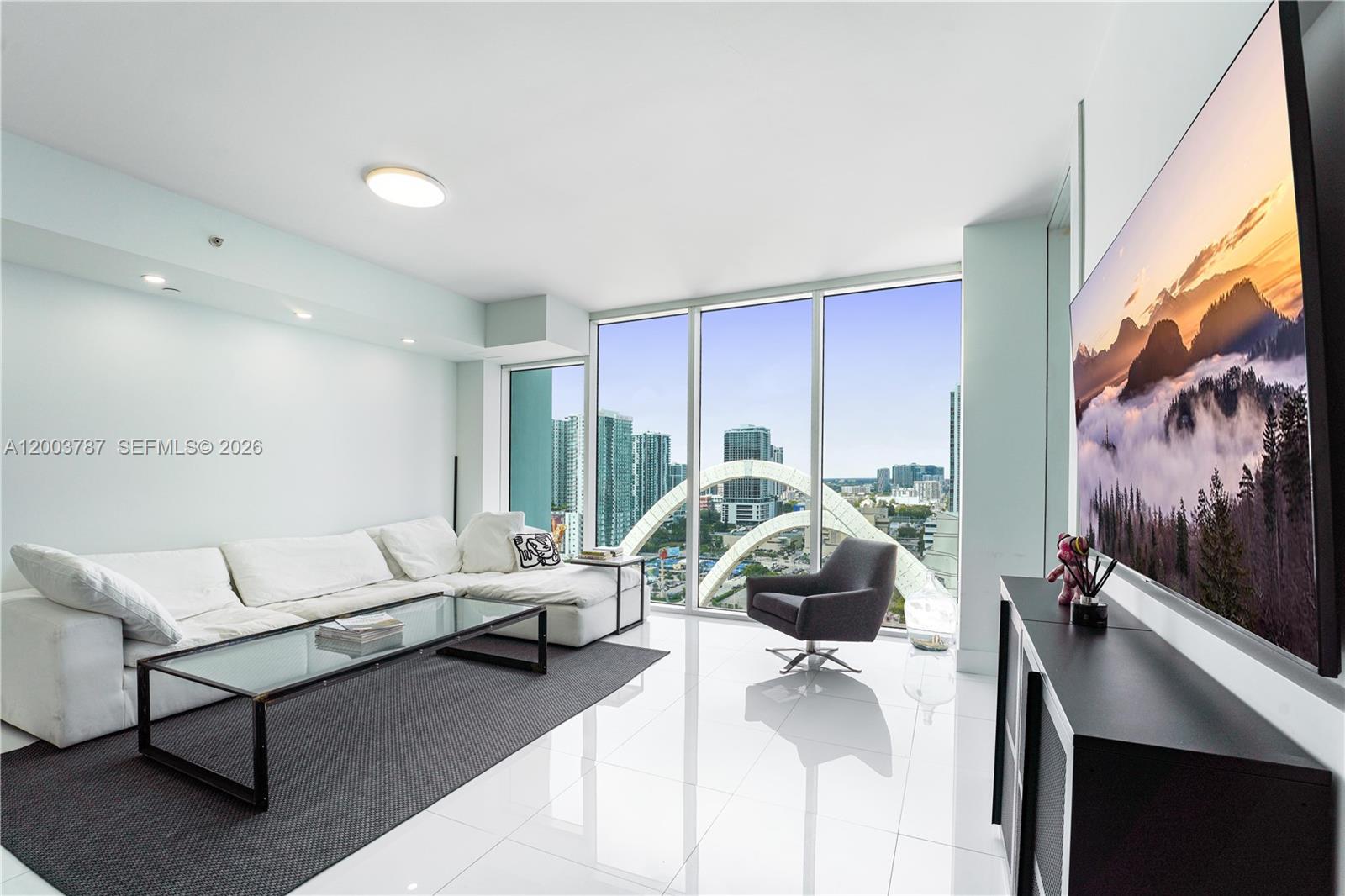 Best Buy at Ten Museum Park in Downtown Miami !  Nestled in the heart of downtown Miami , Ten Museum Park offers an extraordinary Downtown Miami living experience. This luxurious condo boasts 1 bed /1.5 bathrooms with breathtaking views of downtown Miami and bay from its balcony. TMP is a 50 story crystallic structure designed by architect Chad Oppenheim. TMP is located just minutes away from Edgewater, Midtown, Design District, South Beach, and Miami Airport. TMP provides residents with convenient access to the city's finest attractions including the Arsht Center. PAMM and Frost Museum. With its Class A building status, an array of excellent amenities. TMP is an enticing opportunity for those seeking the ultimate Miami lifestyle. The unit offers one parking space, accessible via valet service only.