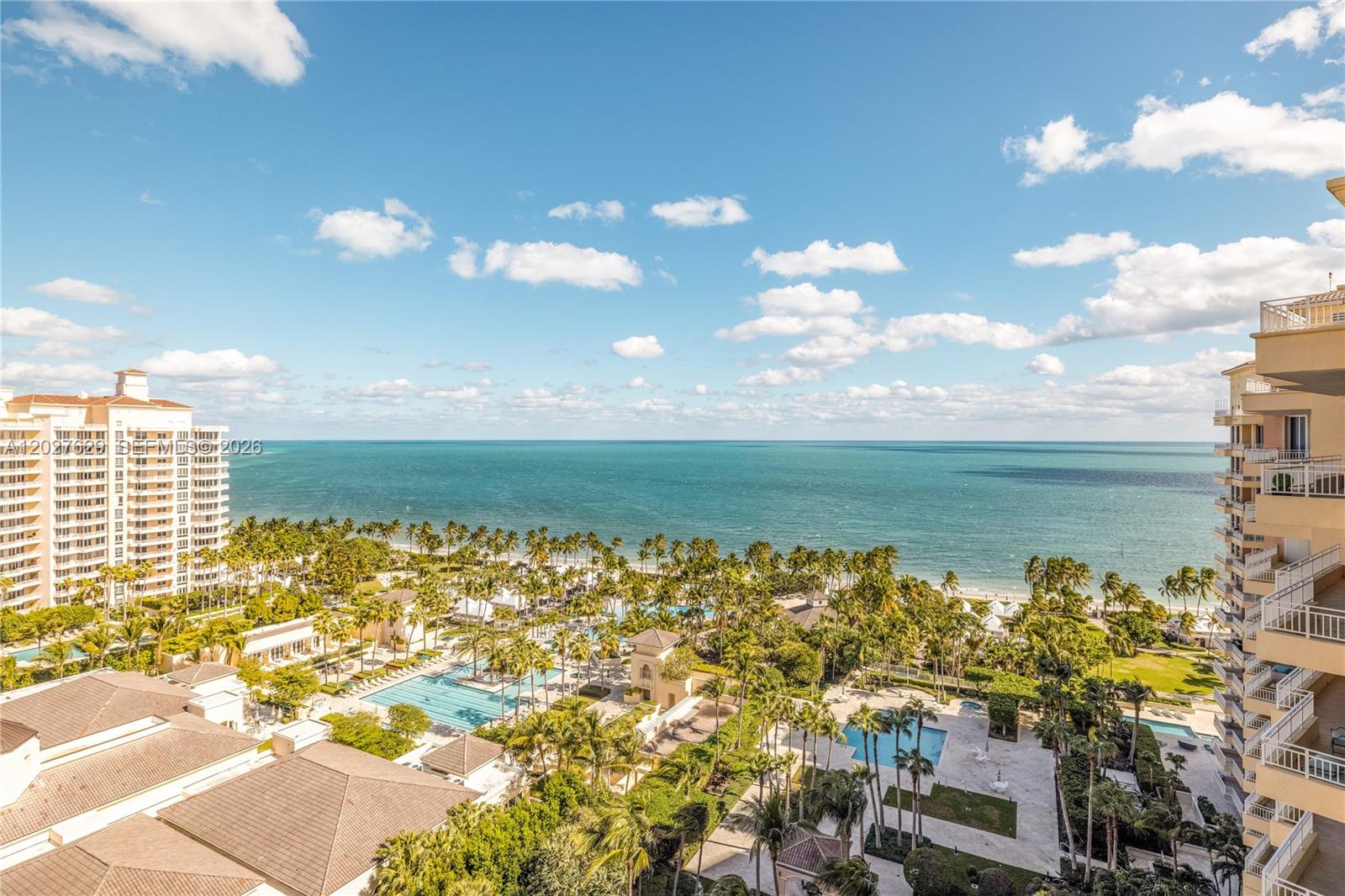 Magnificent ocean and bay views set the stage for this truly one-of-a-kind two-story penthouse, a spectacular house in the sky. Located in Ocean Tower One at the Ocean Club in Key Biscayne, this extensively renovated and redesigned residence offers approximately 4,566 SF of fully functional interior living space across two levels, 5 bedrooms, 5 full baths, and 1 half bath. Thoughtfully redesigned with exceptional attention to detail, the residence features a beautifully renovated kitchen and baths, bespoke built-ins, Italian marble flooring, refined luxury finishes throughout, and new hurricane shutters. Expansive living areas create the feel of a private home with the ease of condominium living. A spectacular private rooftop terrace of just under 2,000 SF, separate from the interior living area, offers endless possibilities for entertaining, lounging, or the potential for a jacuzzi while enjoying breathtaking water views. Beachfront access and world-class Ocean Club amenities complete this exceptional offering. Select Artefacto furnishings and accessories available for negotiation.